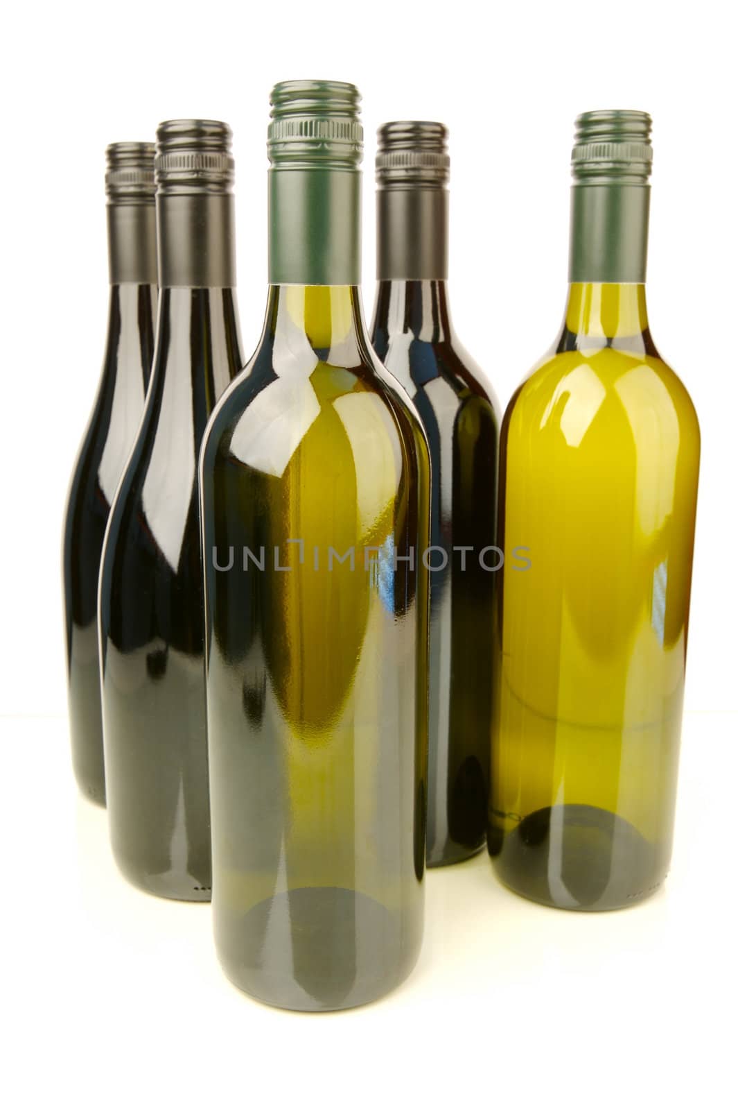 Bottles of red and white wine isolated against a white background