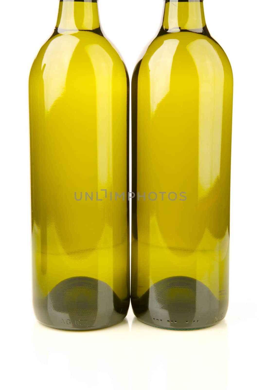 White wine bottles isolated against a white background