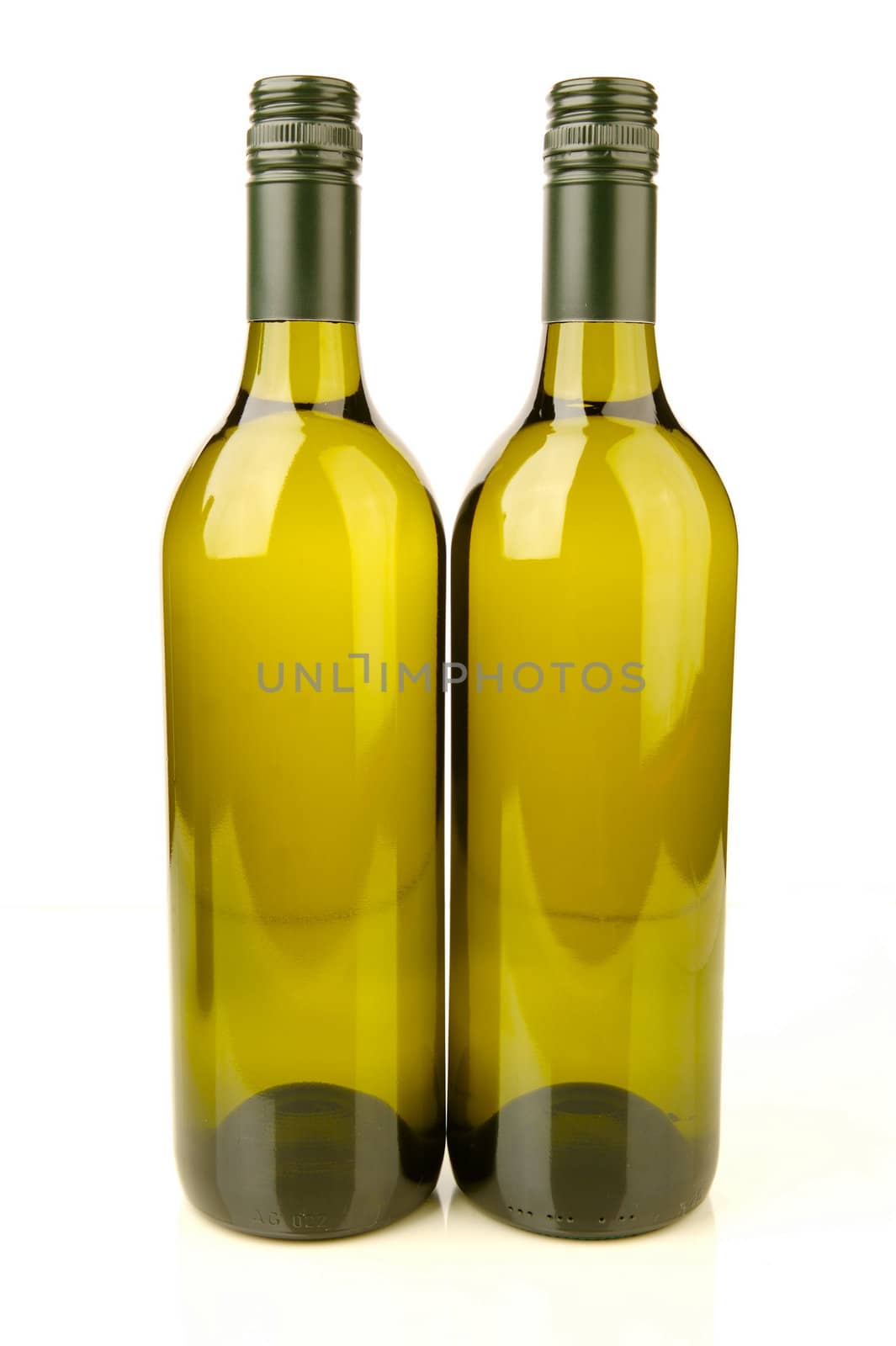 White wine bottles isolated against a white background