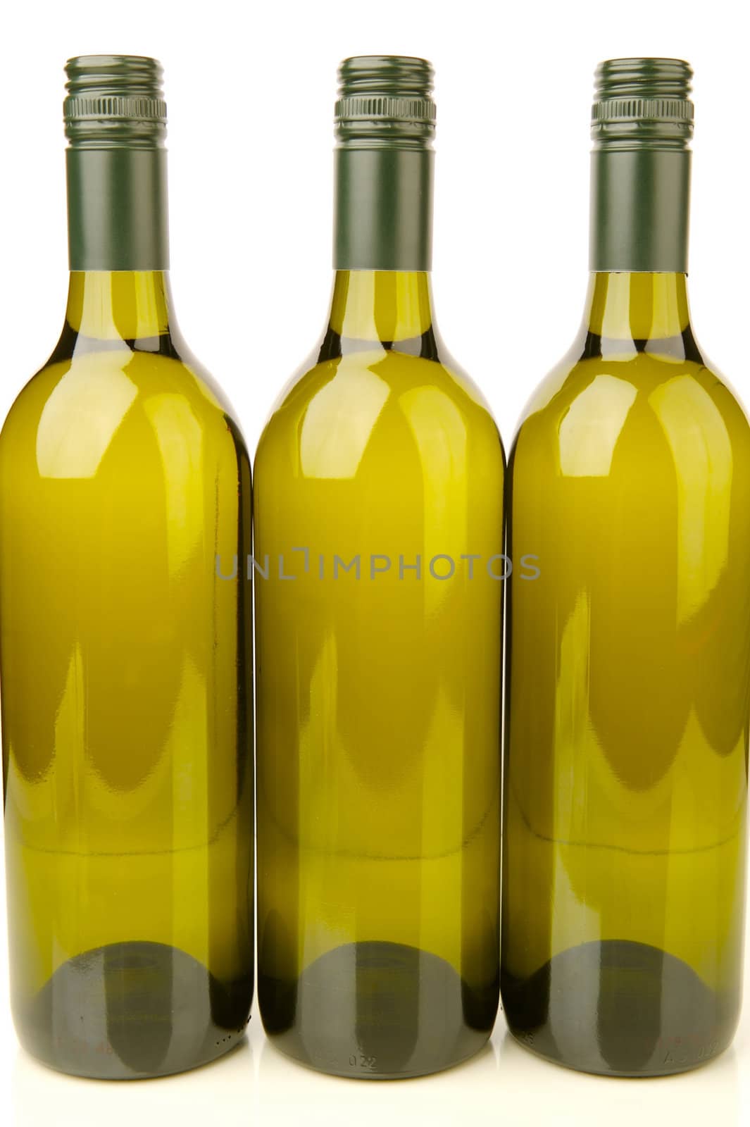 White wine bottles isolated against a white background