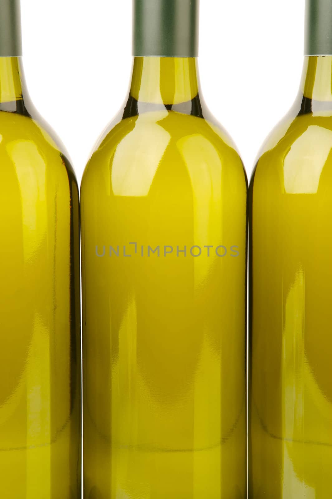 White wine bottles isolated against a white background