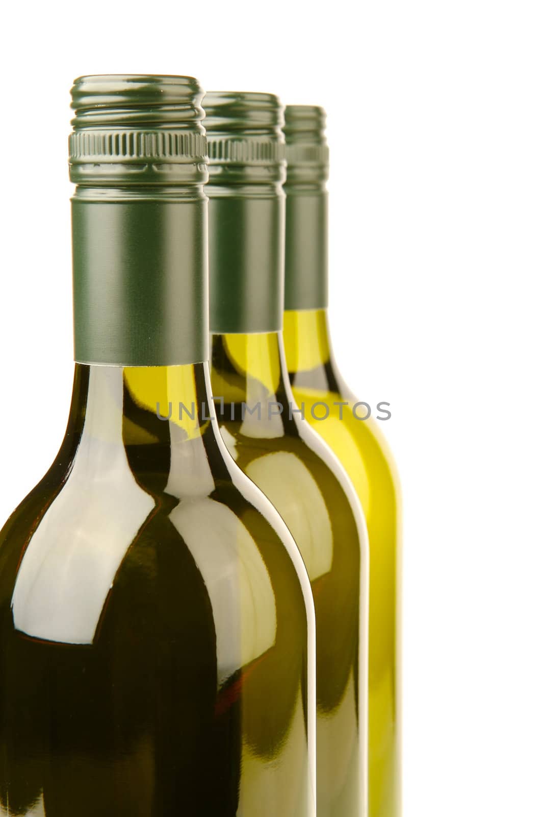 White wine bottles isolated against a white background