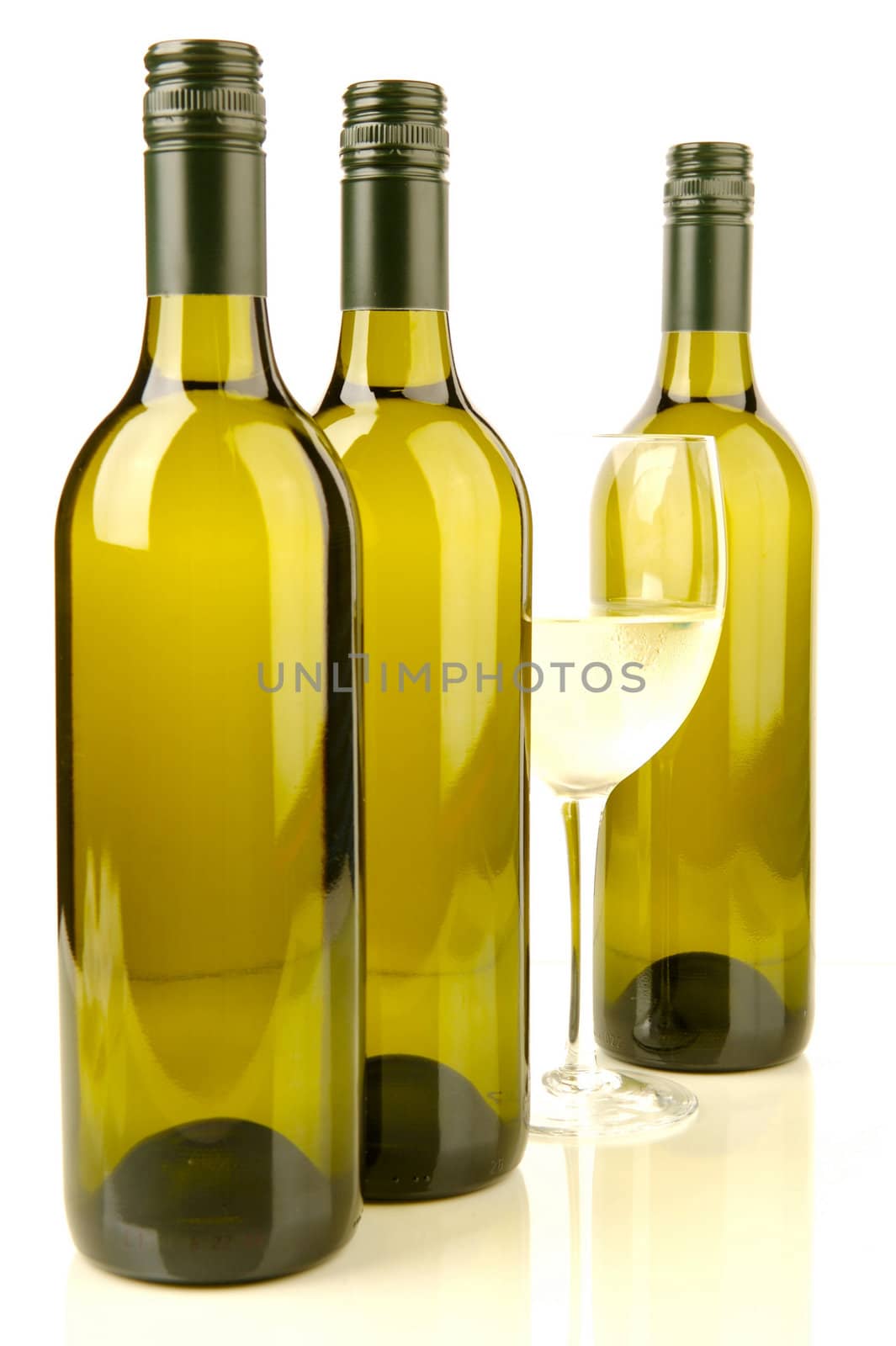 White wine bottles isolated against a white background