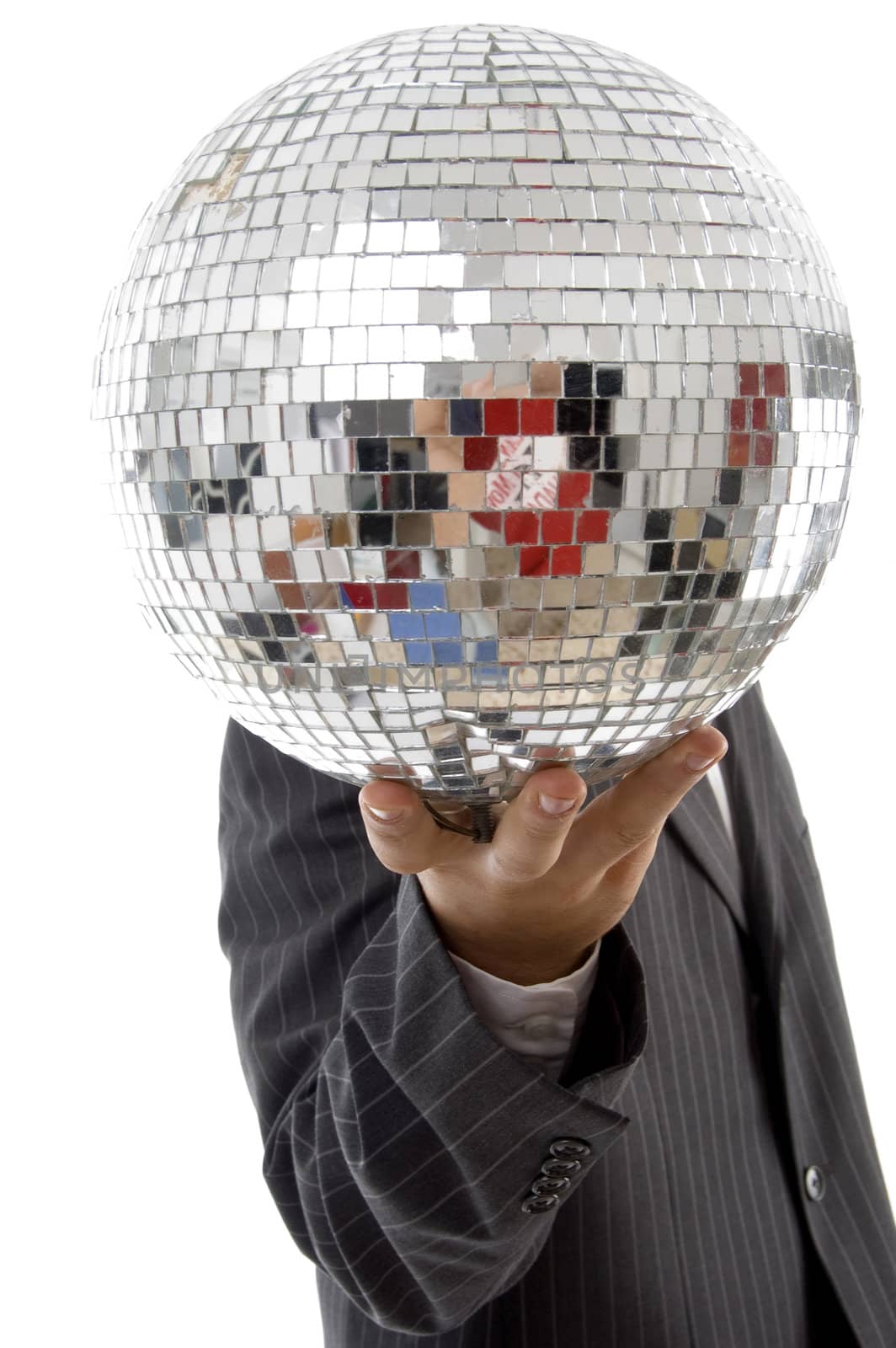 young guy hidden his face with disco ball on an isolated white background