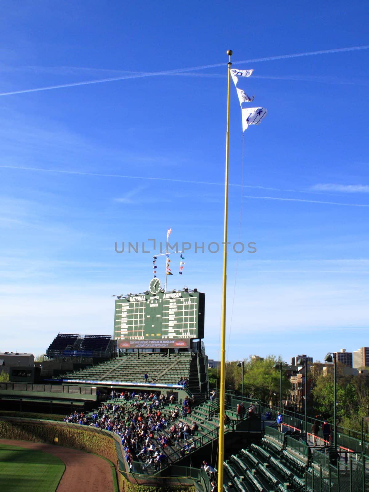 Famous scoreboard, ivy and bleachers before a Cubs game against the Washington Nationals