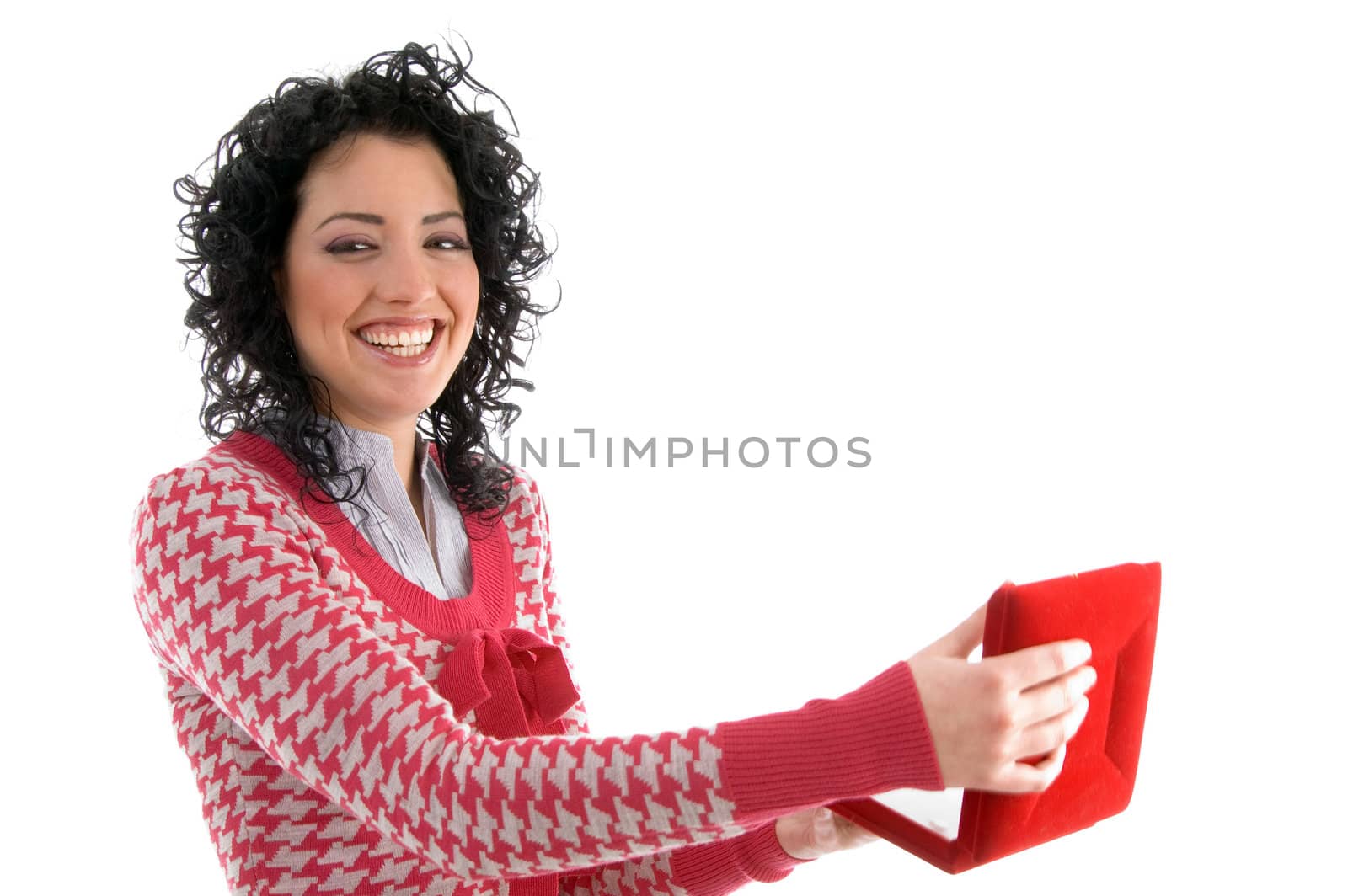 side view of smiling woman posing with necklace box on an isolated white background