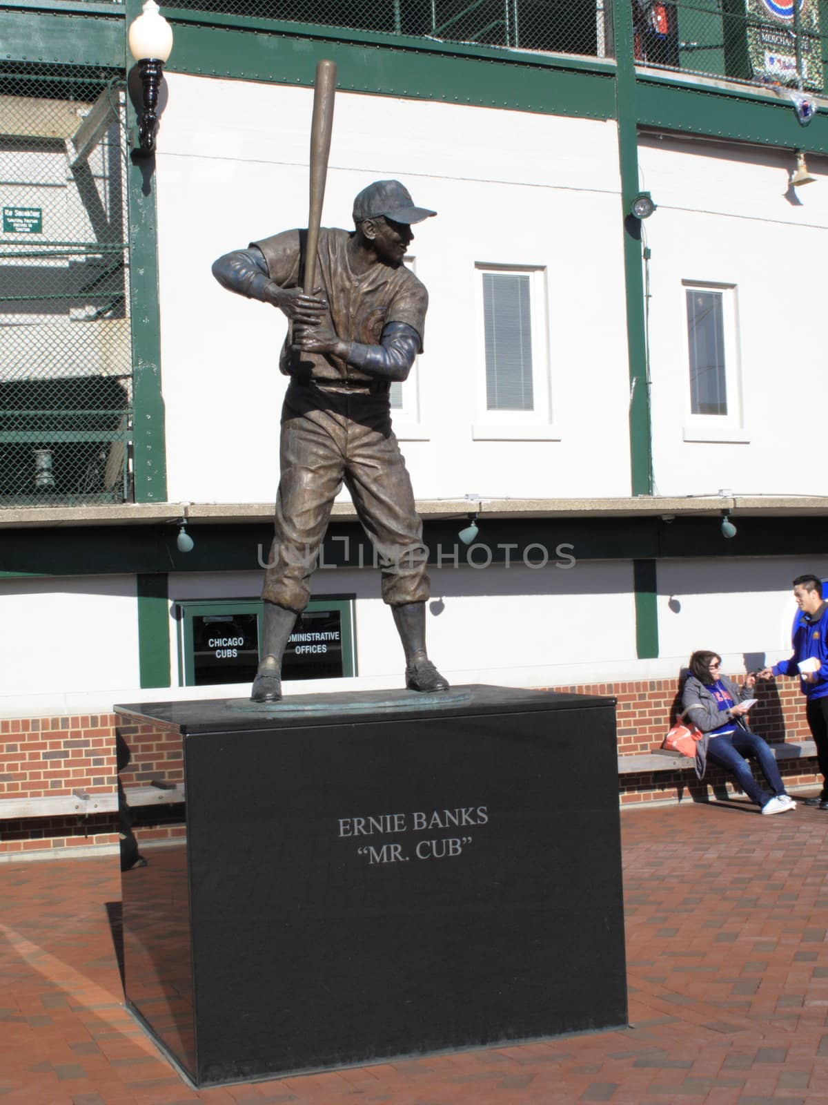 Ernie Banks statue with fans outside Cubs home ballpark