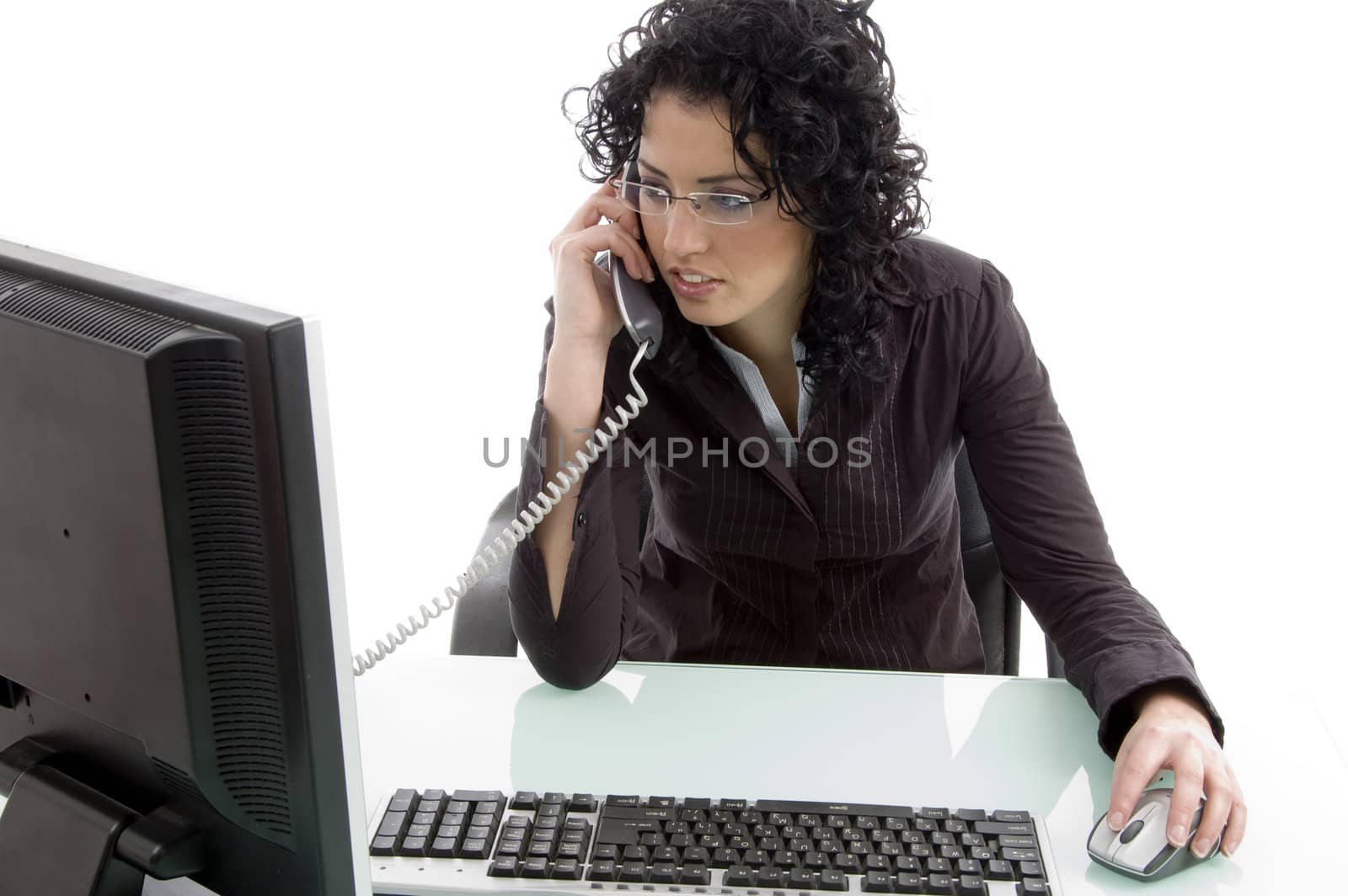 young woman working on computer against white background