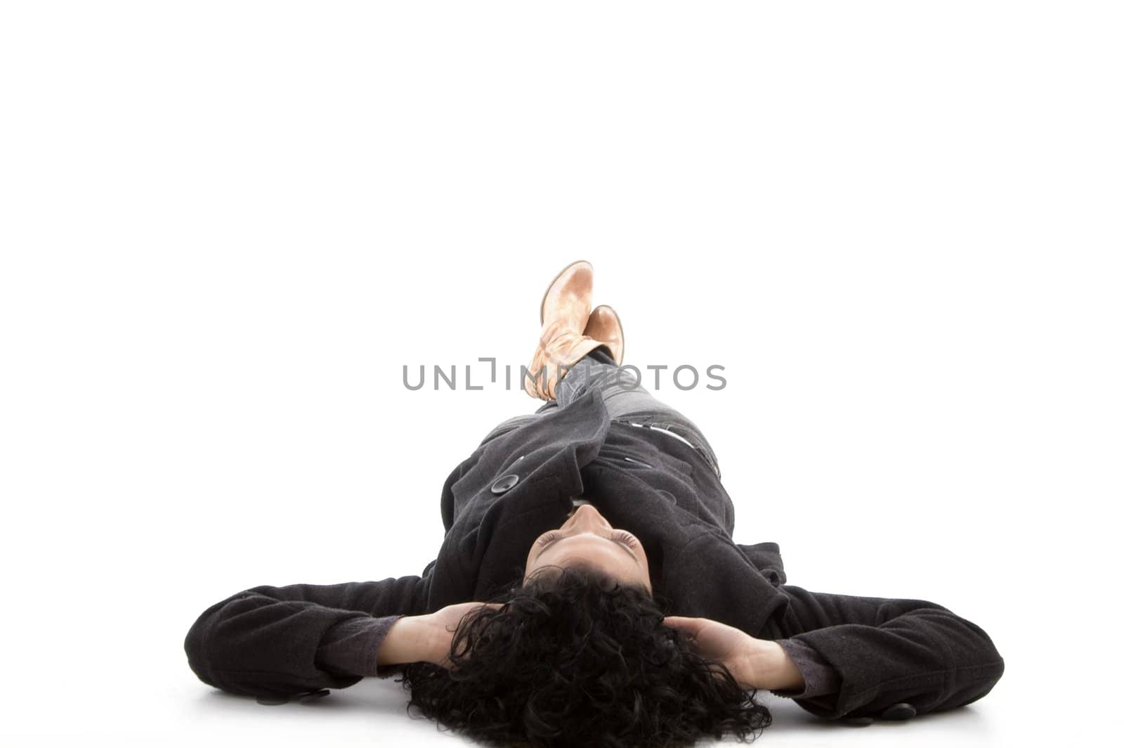 laying model looking upward against white background