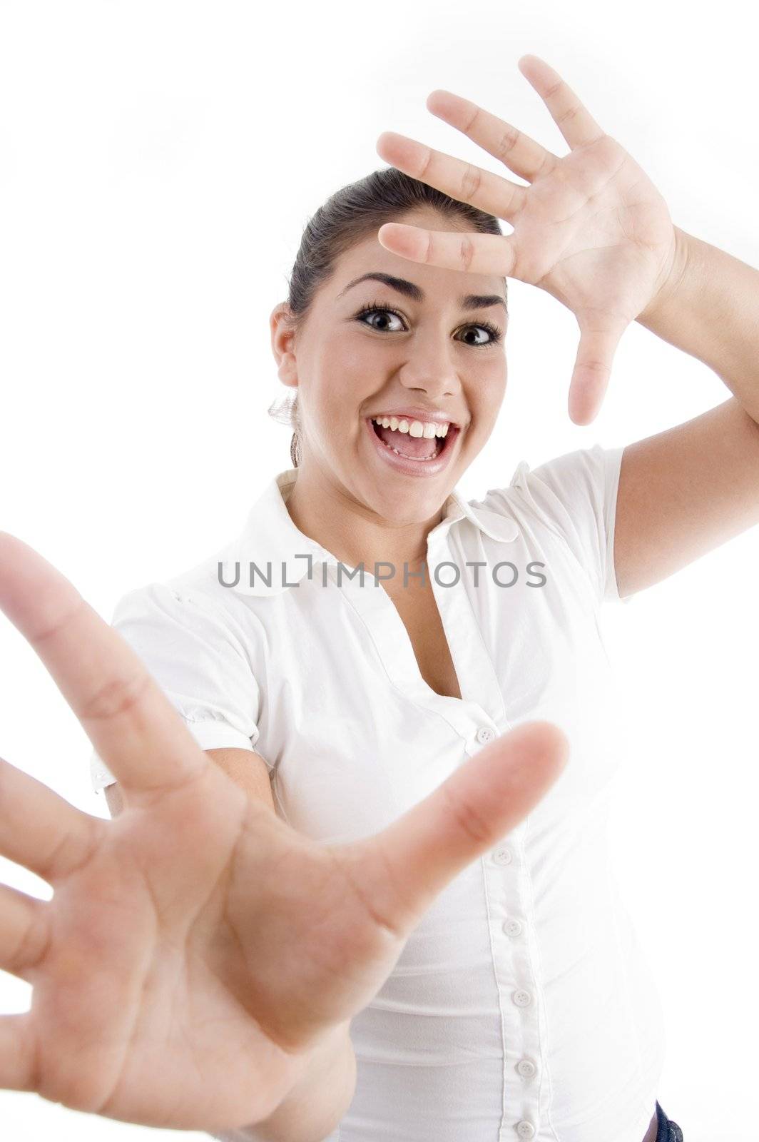 pretty young caucasian smiling against white background