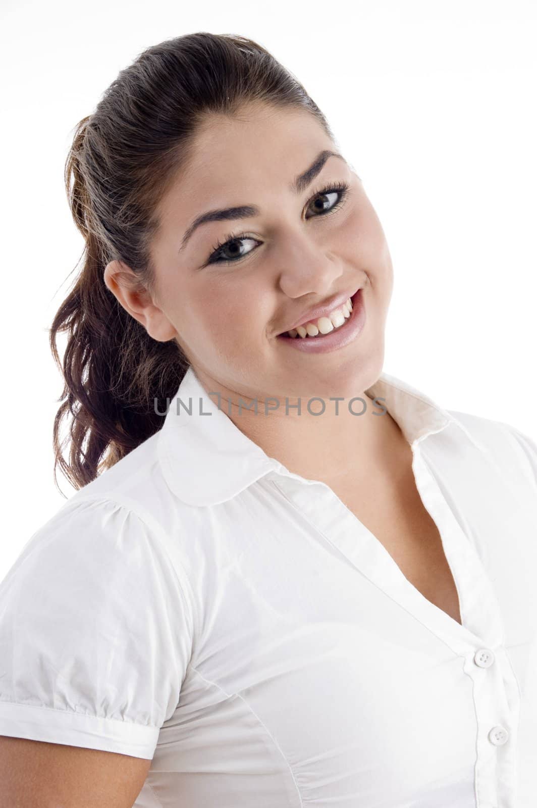 pretty young caucasian smiling and looking at camera on an isolated background