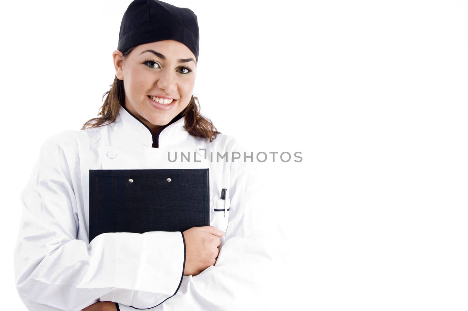 beautiful female chef holding notepad against white background