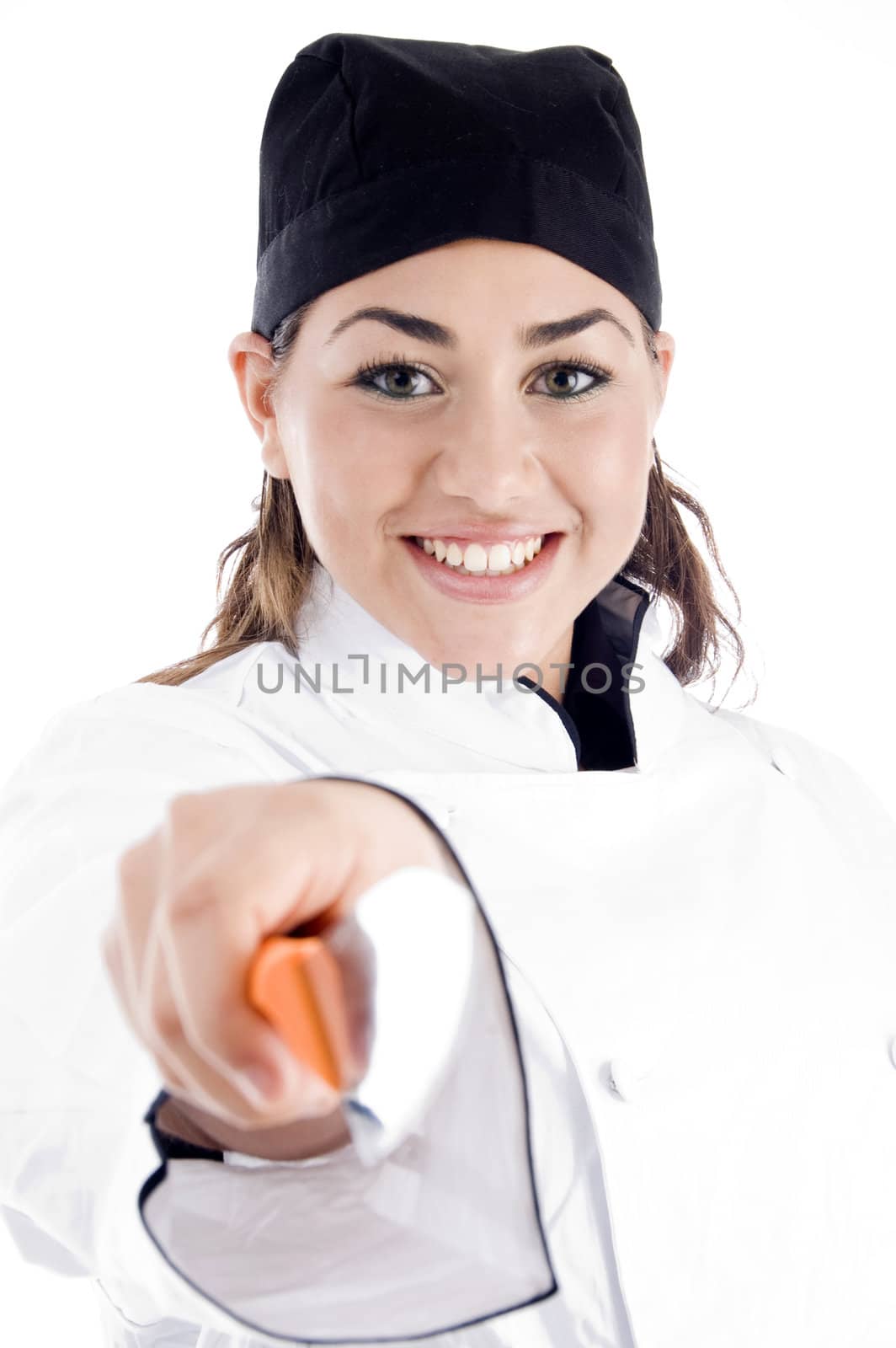 professional female chef holding kitchen tool against white background