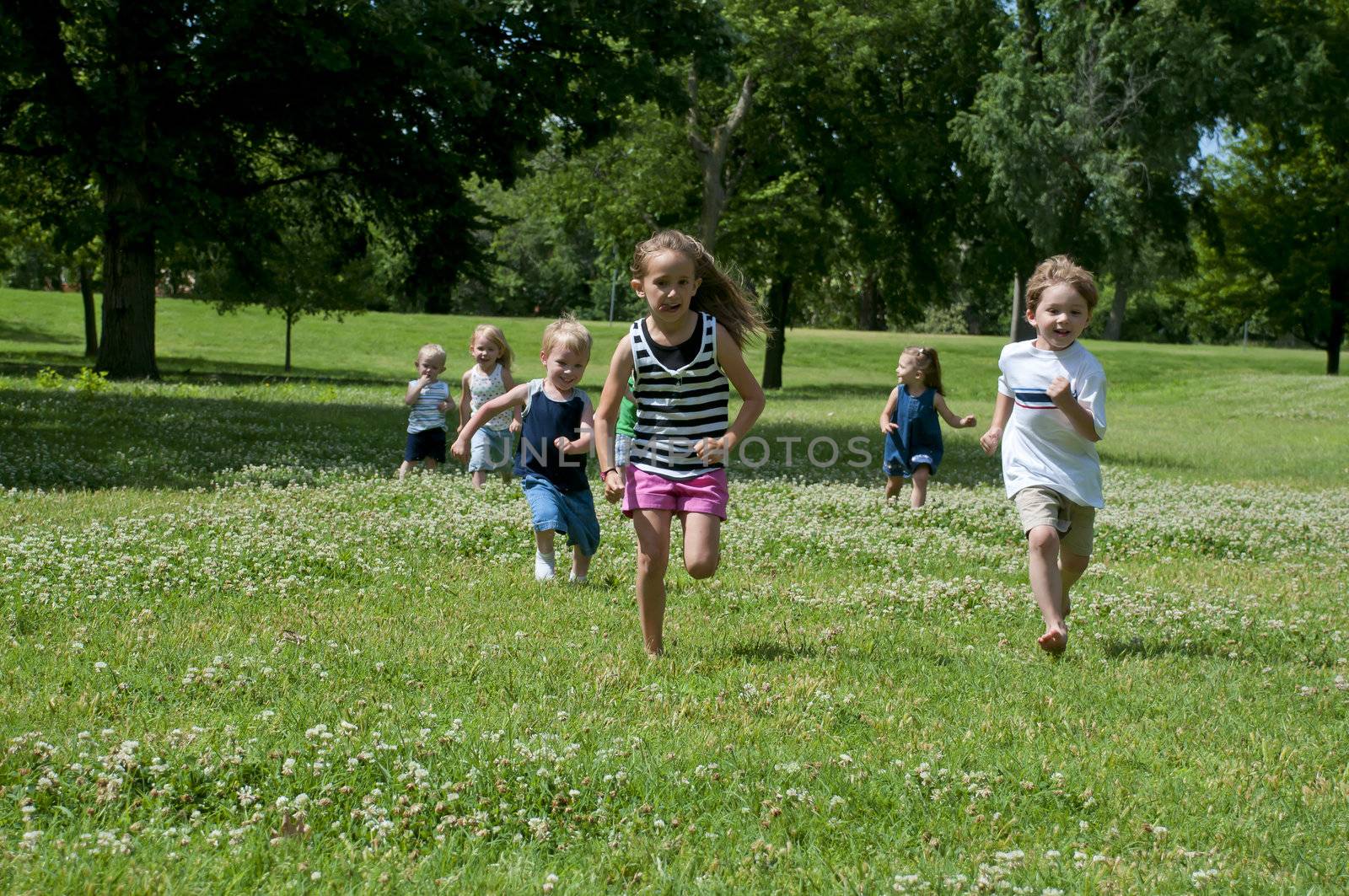 kids having summer fun outdoors at the park