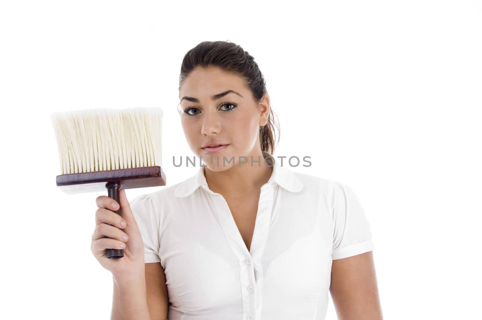 close up view of female cleaner holding dusting brush by imagerymajestic