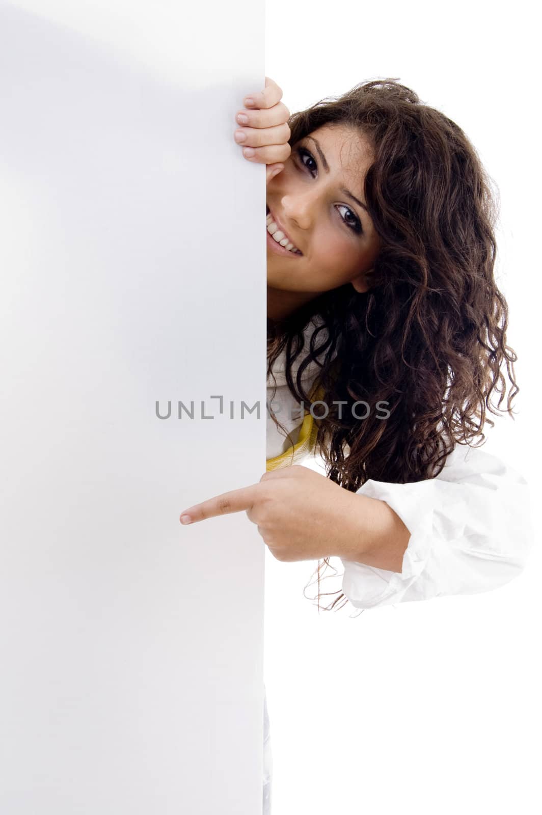 young cute woman indicating towards placard  by imagerymajestic