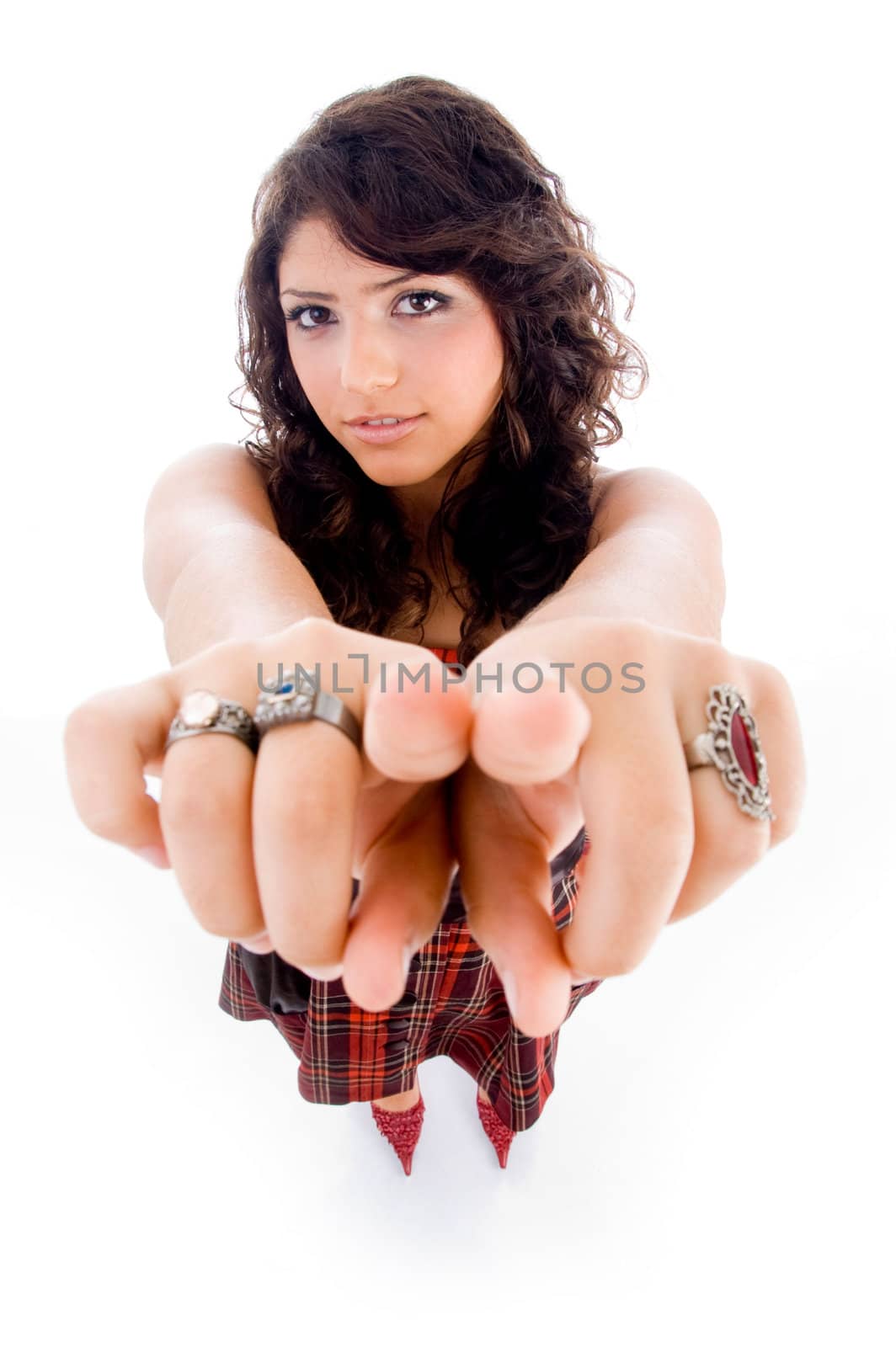 high angle view of pointing female against white background