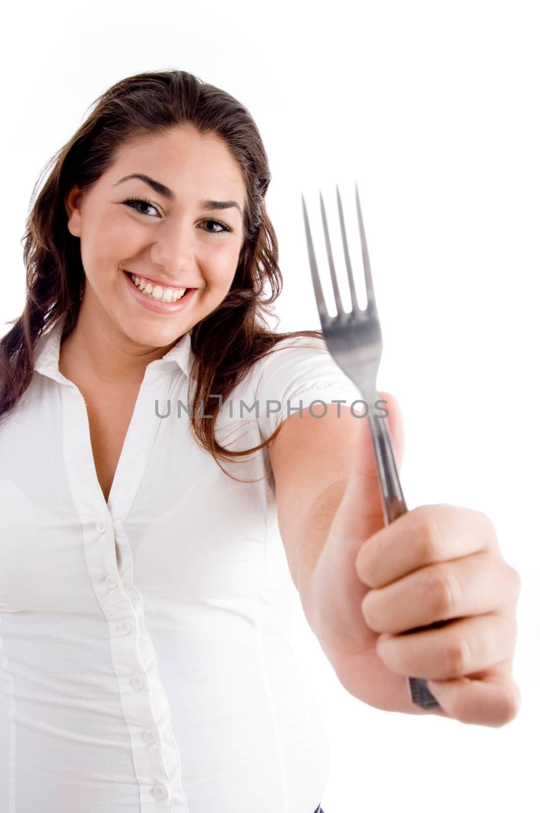 smiling woman showing fork on an isolated white background