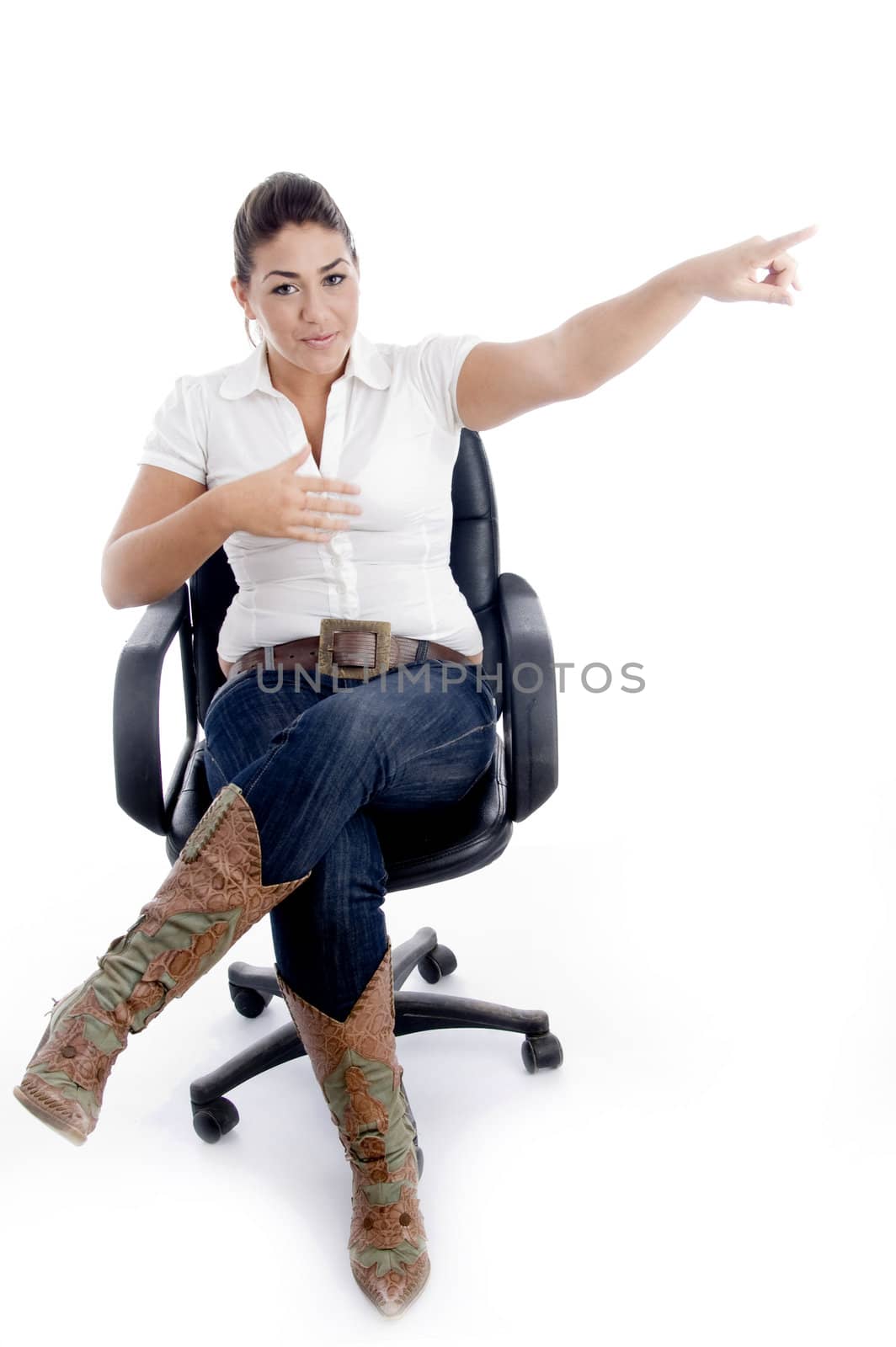 pointing female sitting on chair against white background