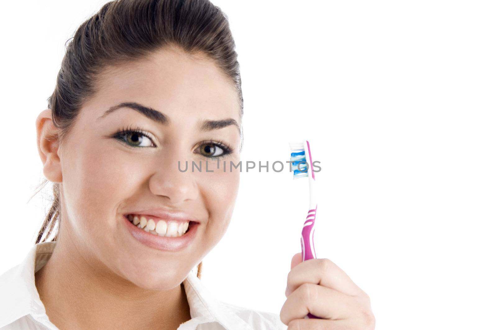 smiling woman with toothbrush on an isolated background