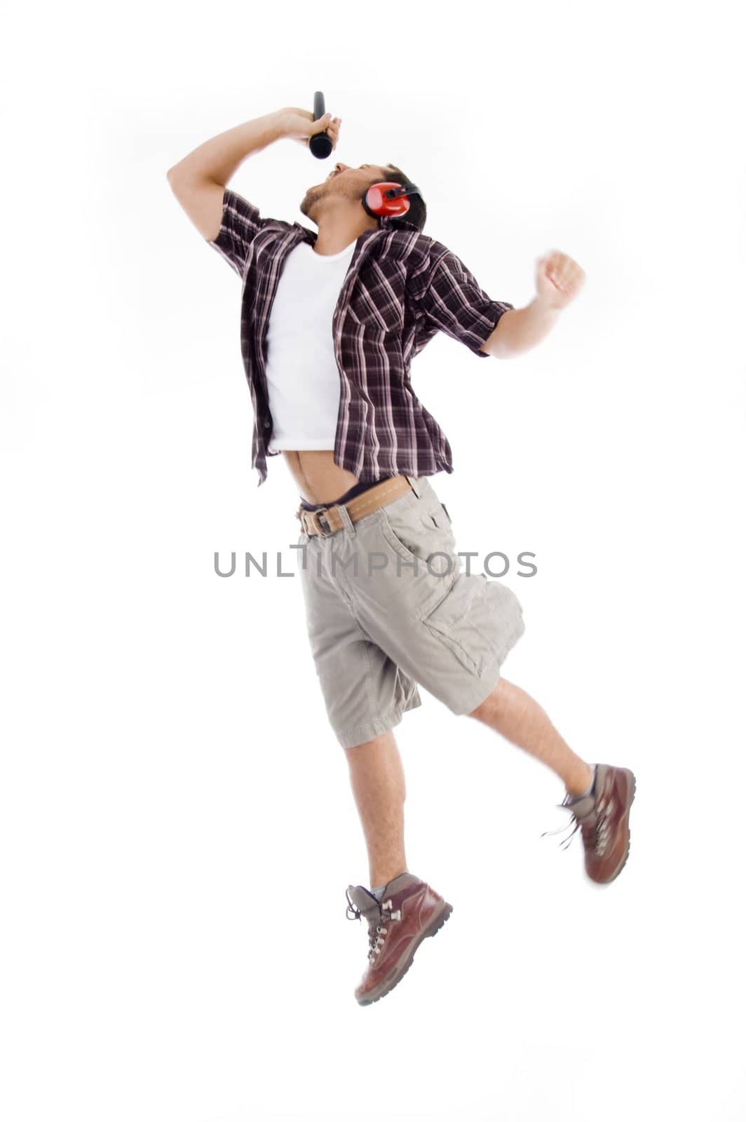 male model  jumping high in air on an isolated white background