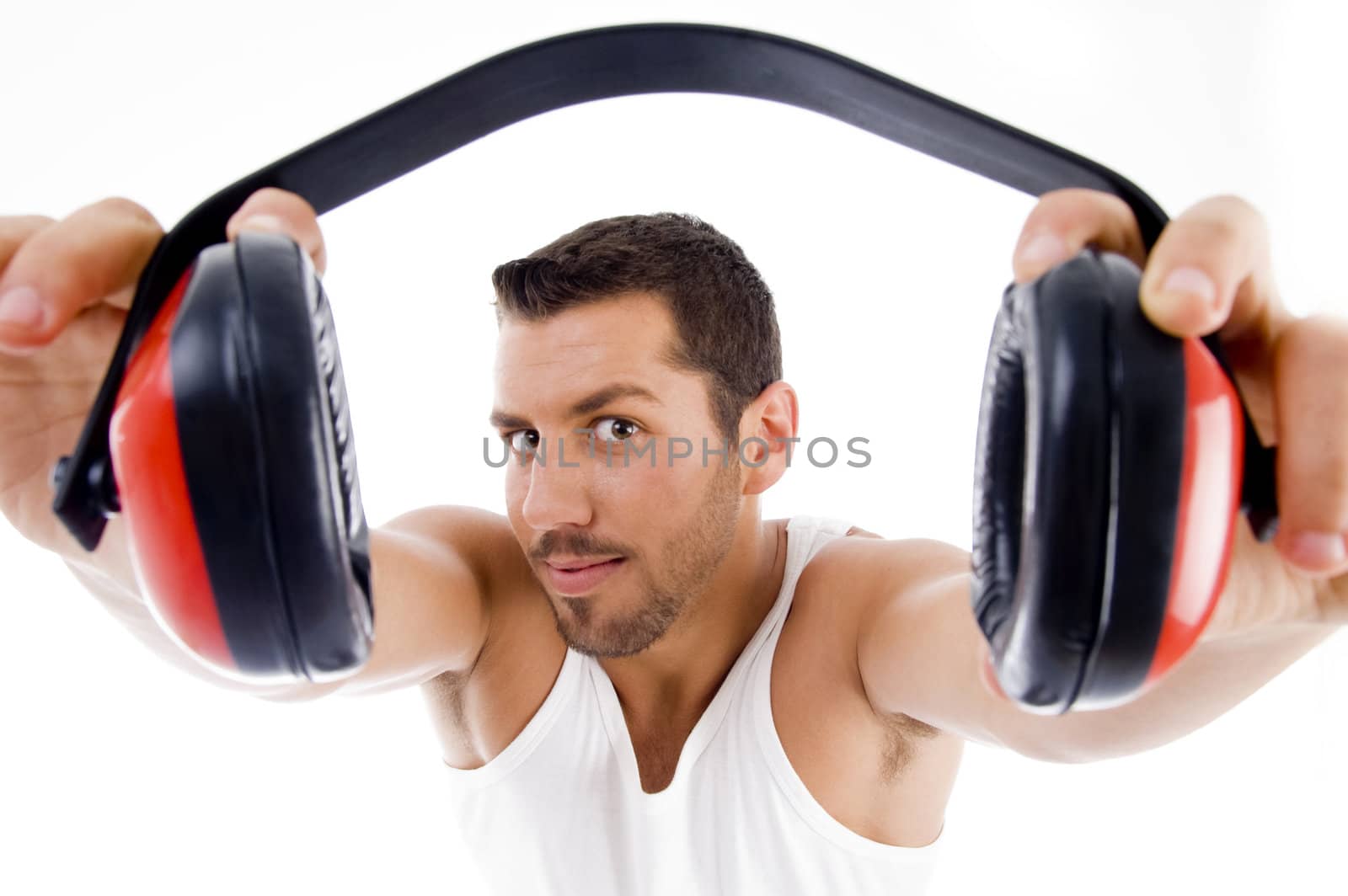 handsome male showing headphone on an isolated white background