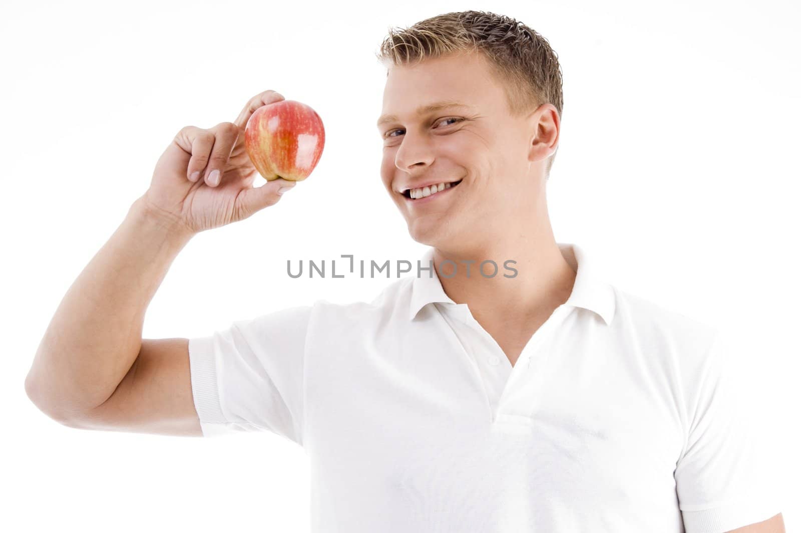 smiling man holding apple on an isolated background