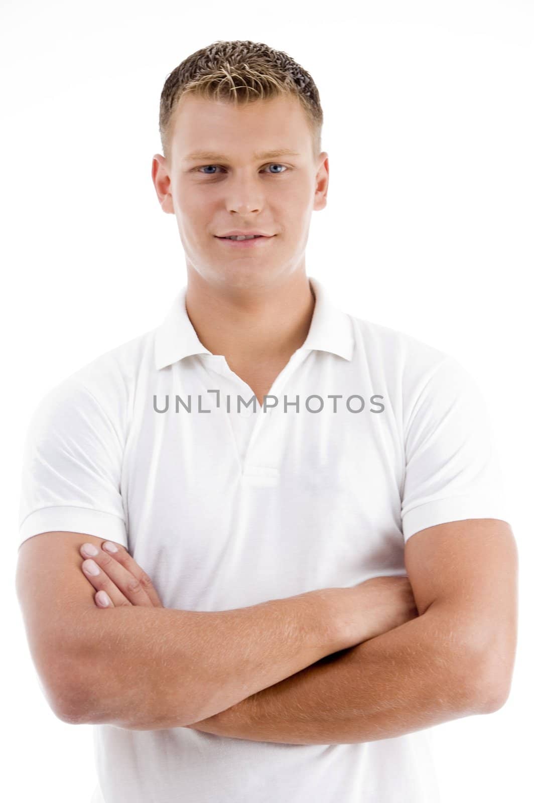 folded arms man looking at camera on an isolated white background