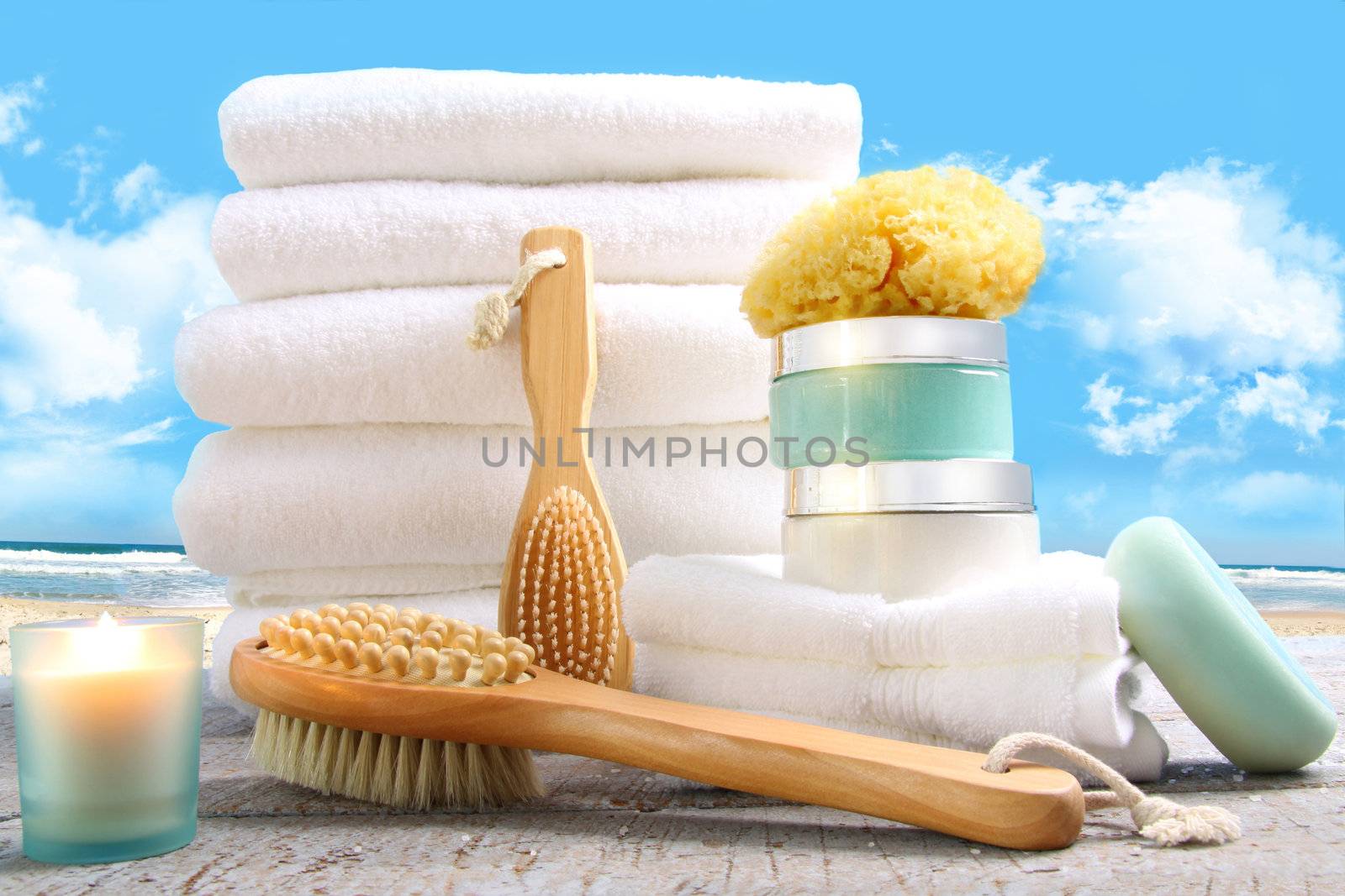 White towels with bath accessories at the beach
