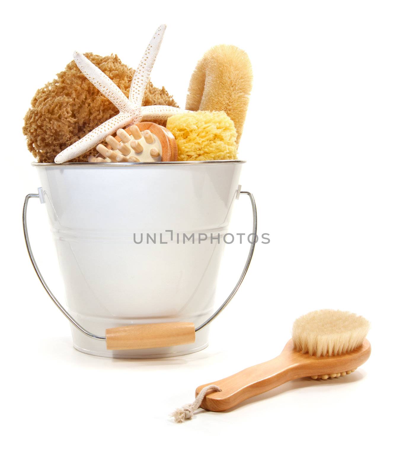 White bucket filled with sponges and scrub brushes  by Sandralise
