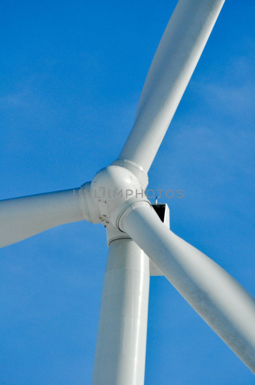 Indiana Wind Turbine in a blue sky by RefocusPhoto