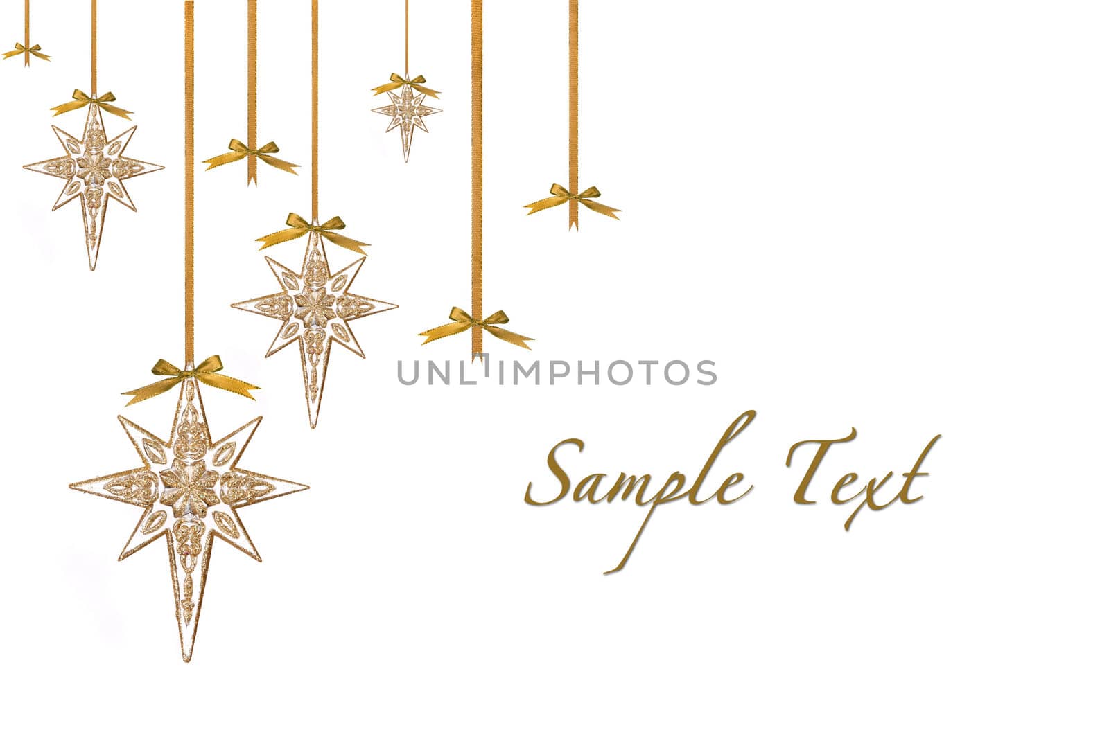 Christmas Ornament Stars Hanging from Ribbon and Bows Isolated on White WIth Copyspace