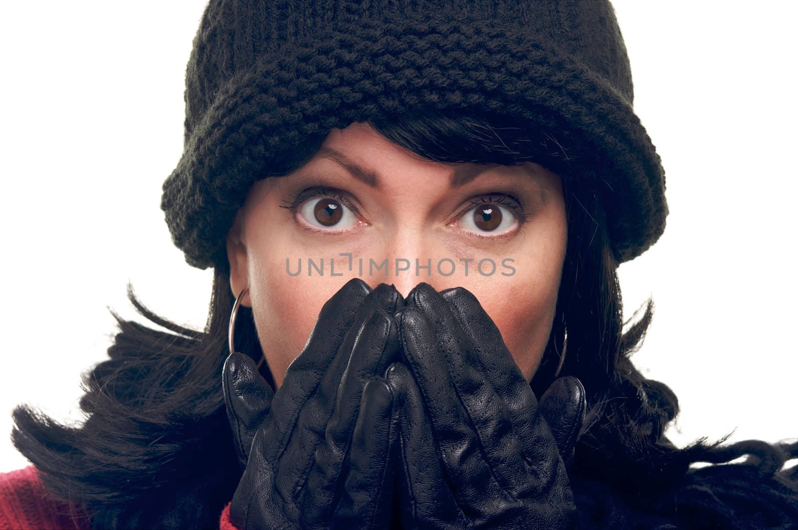 Attractive Woman with Hands to Her Face Isolated on a White Background.