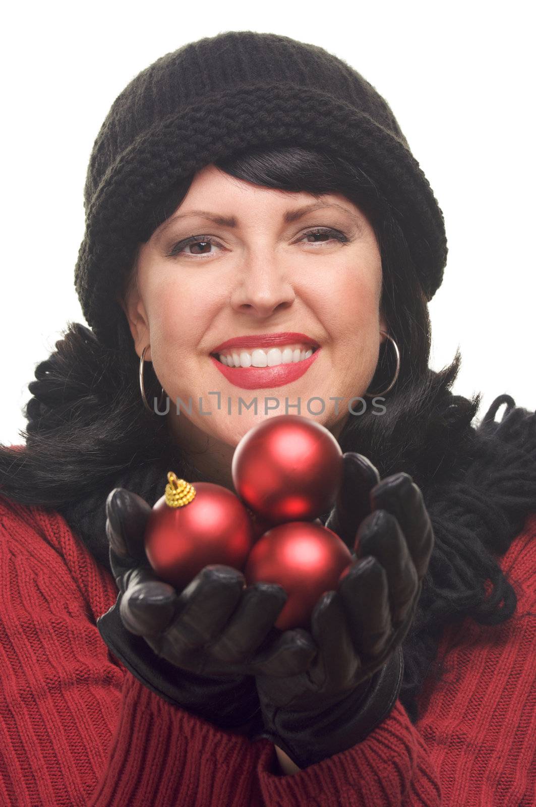 Attractive Woman Holding Red Ornaments Isolated on a White Background.