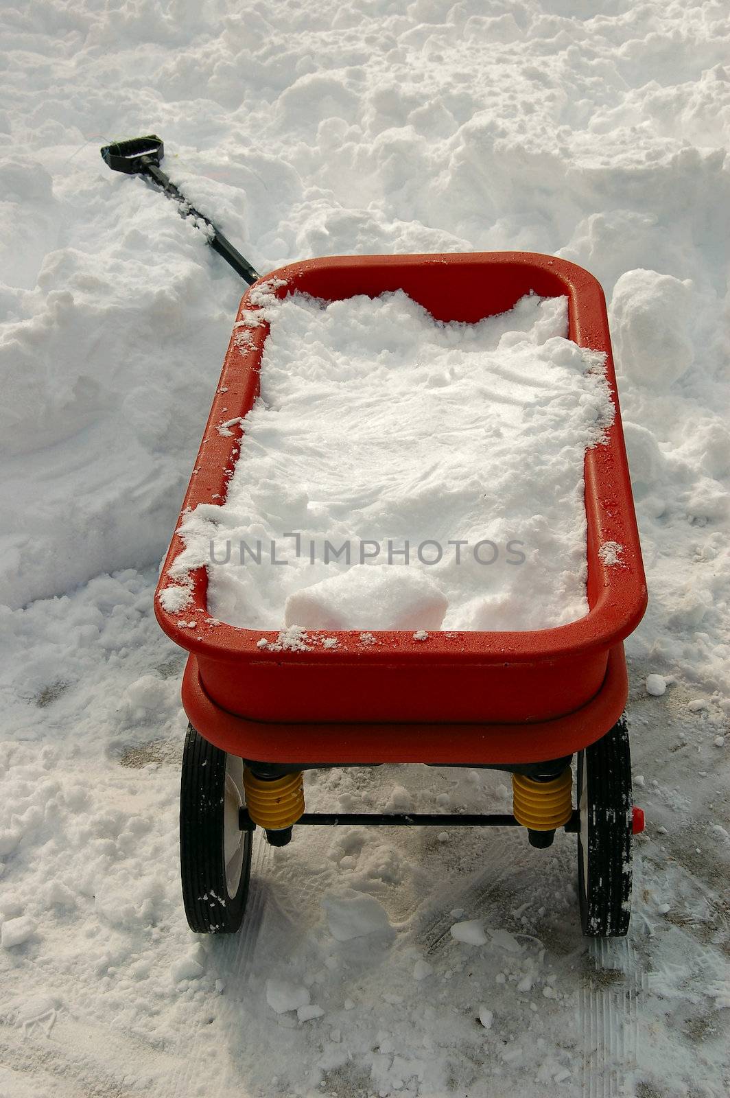 Red Wagon Full of Snow by RefocusPhoto