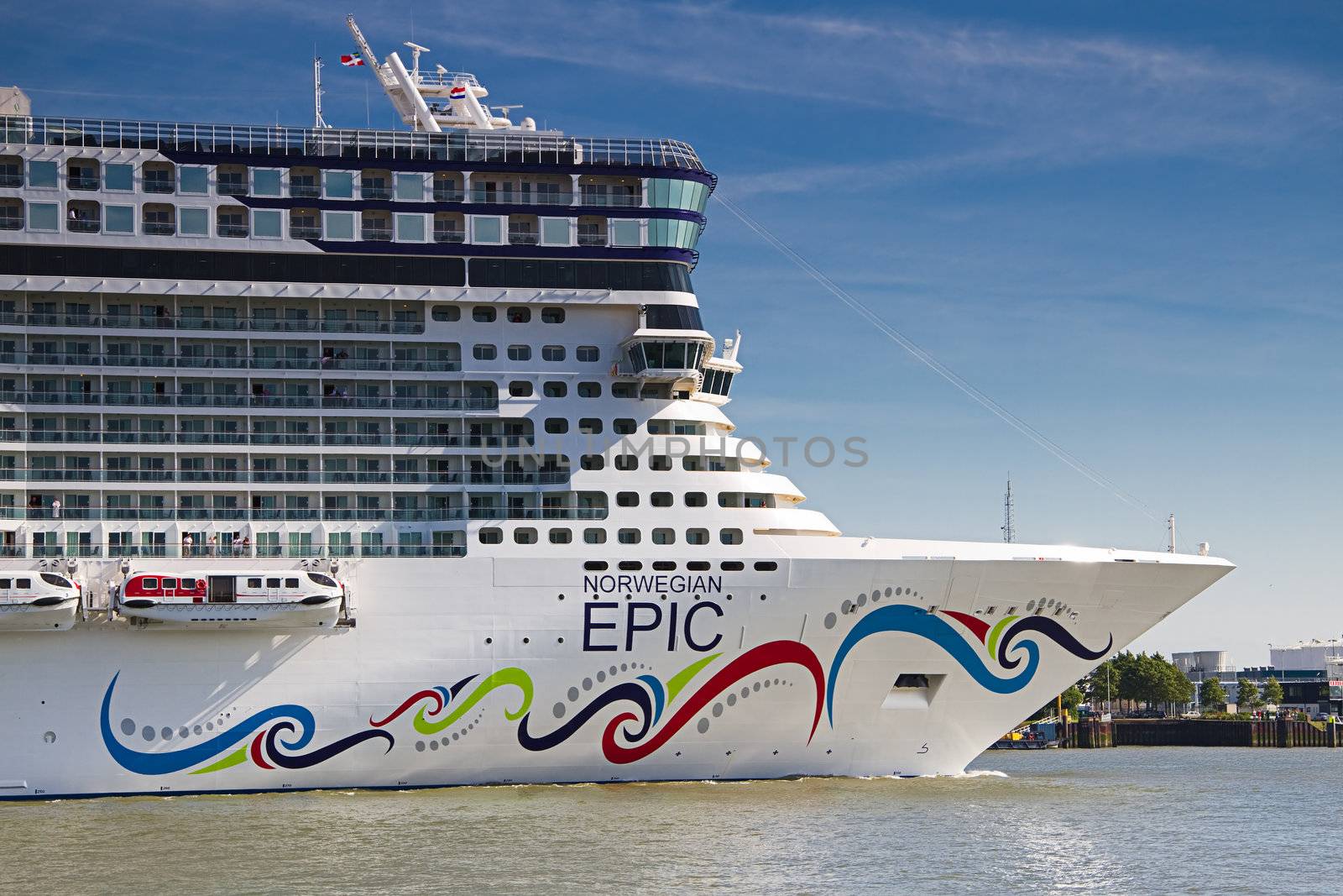 VLAARDINGEN, THE NETHERLANDS-JUNE 2010 The new build big cruiseship Norwegian epic leaving Rotterdam on her way to New York. june 21, 2010, Vlaardingen