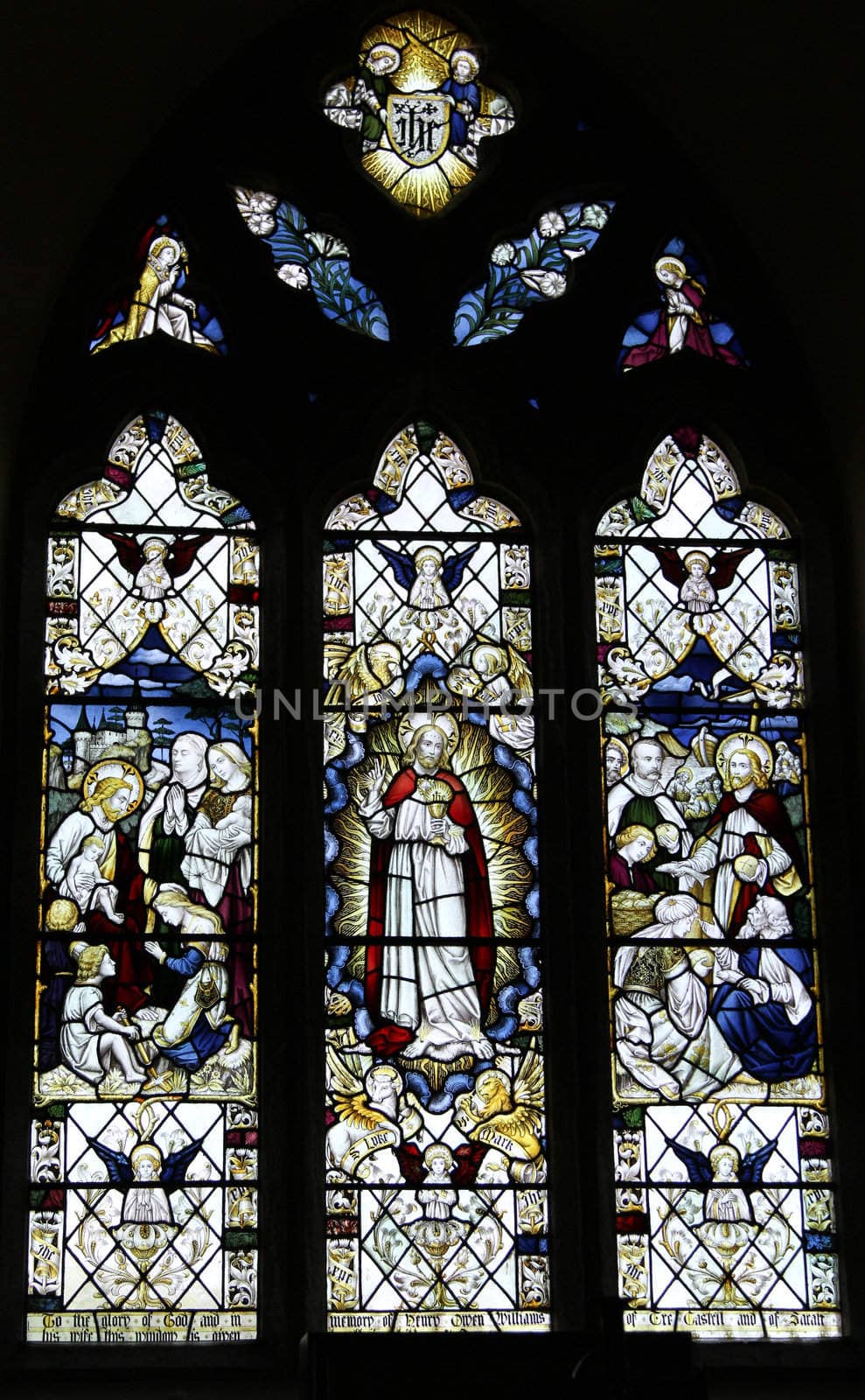 Historic stained glass window, christian theme.