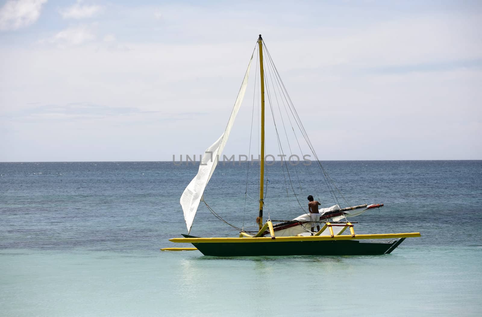 Lonely boat at ocean. Philippines. Island Boracay