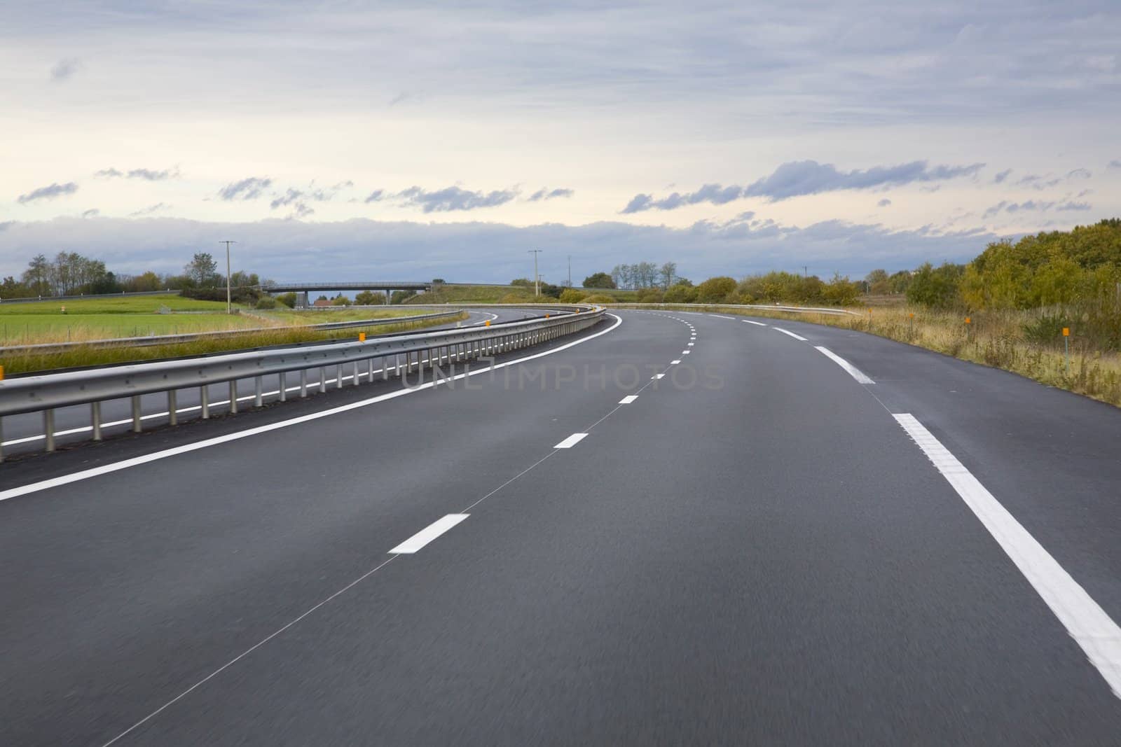 Empty freeway in Europe from a moving car