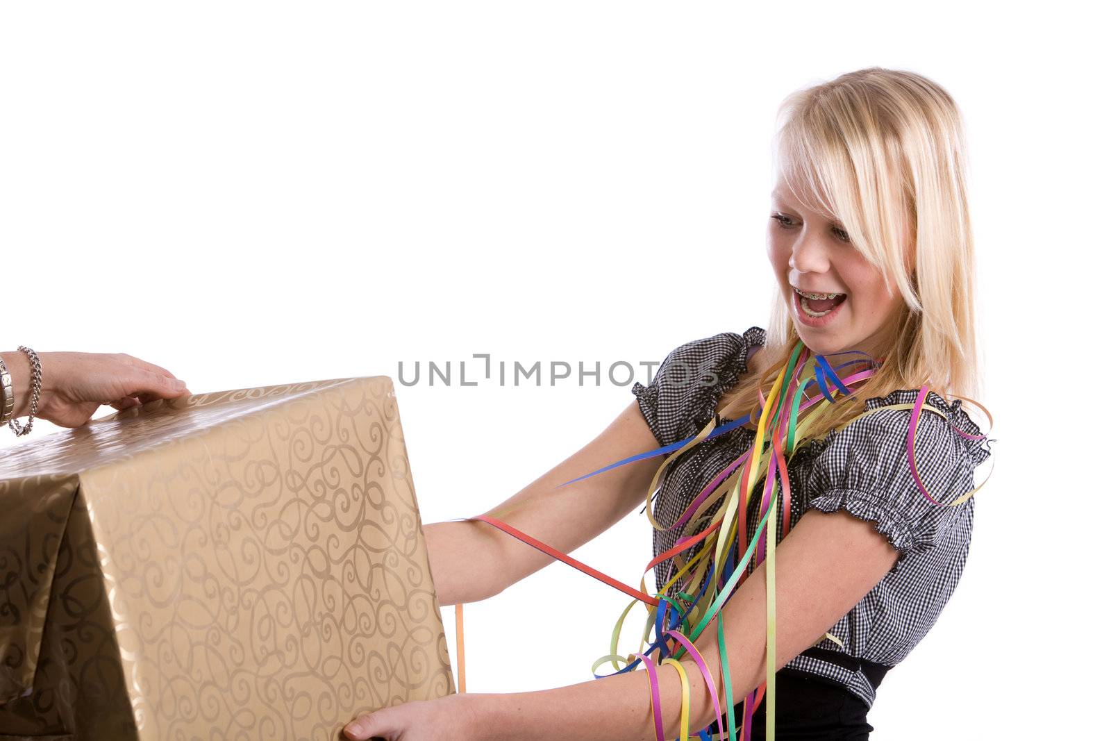 Young teenage girl getting a big box for a present