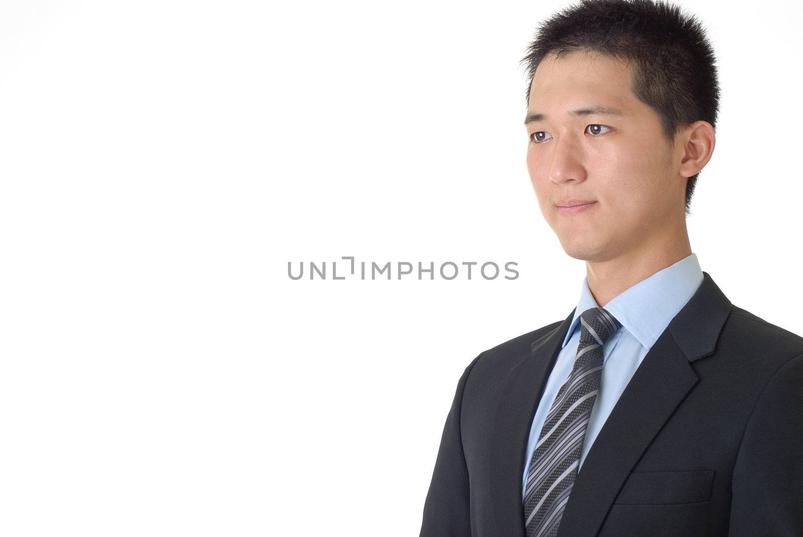Young Asian businessman portrait with confident face on white background.