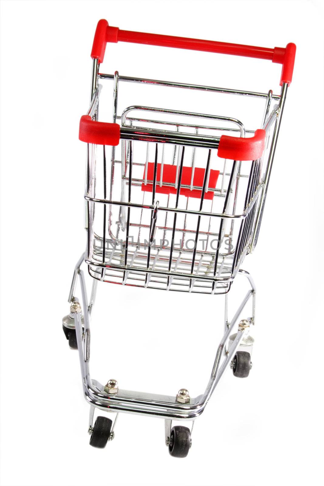 Red and silver shopping trolley on white background
