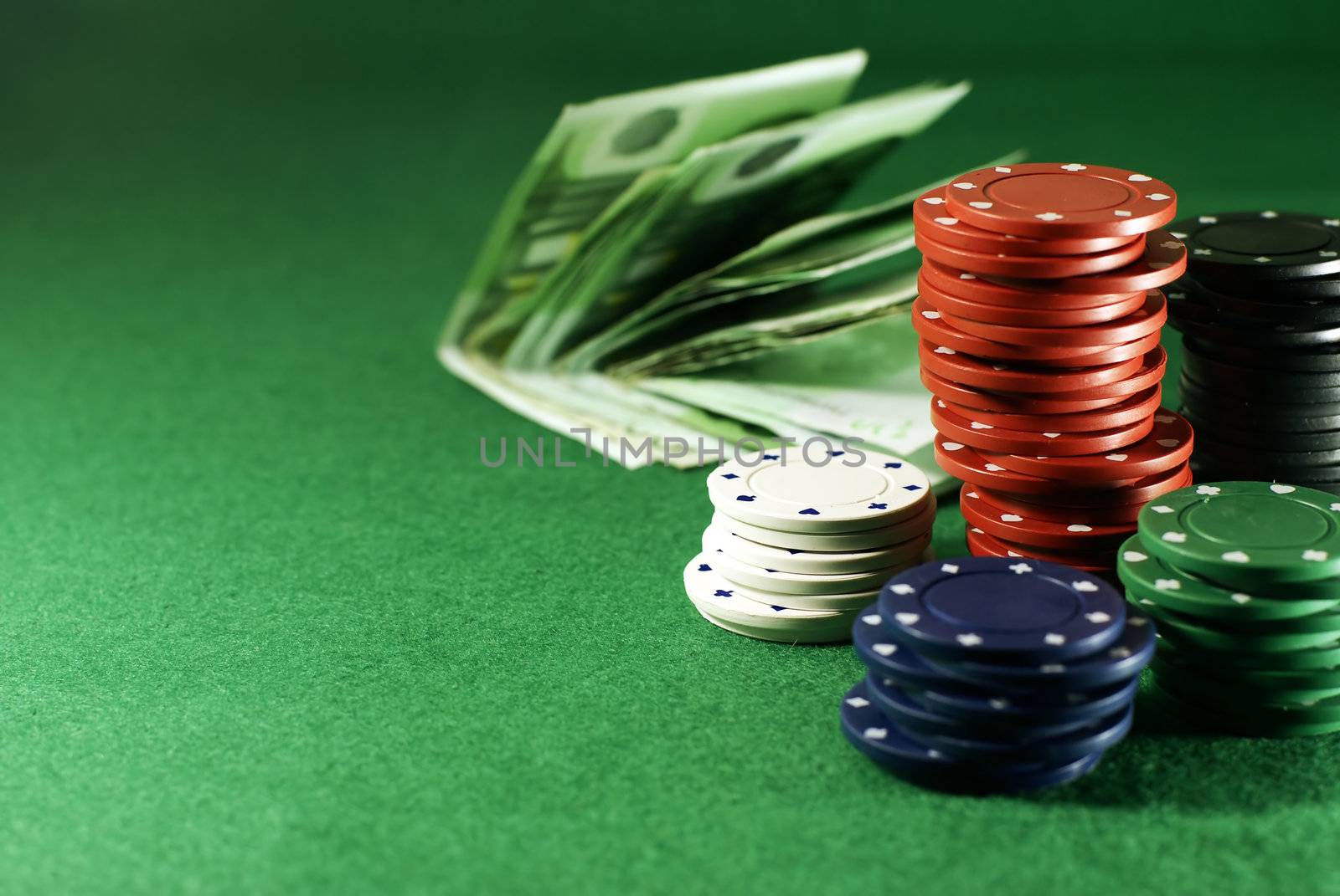 dibs and money on the casino table with copyspace   
