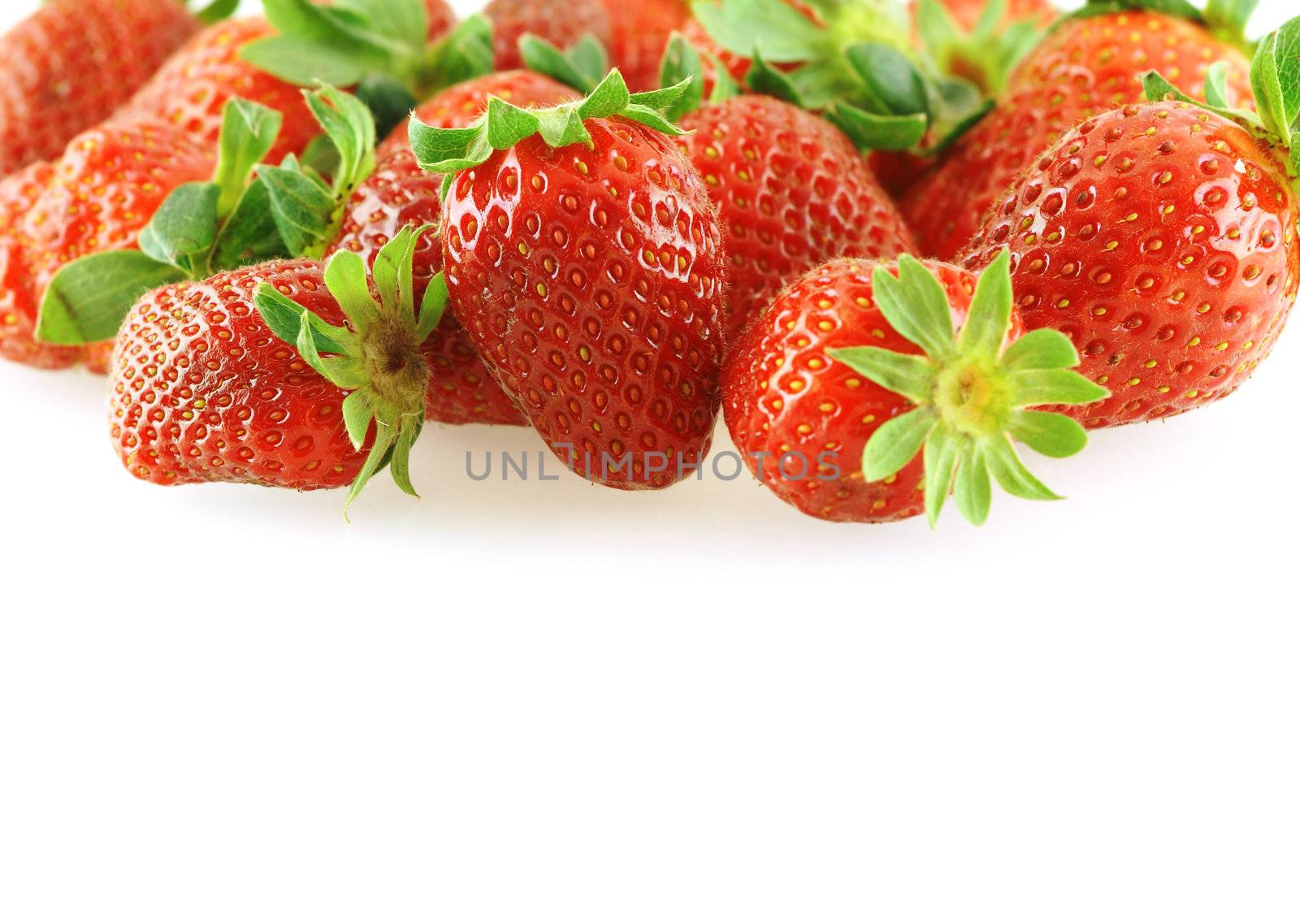 fresh bright juicy strawberry over white as a background with copy space