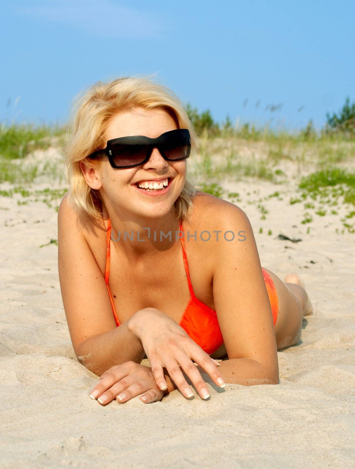 happy girl in orange bikini