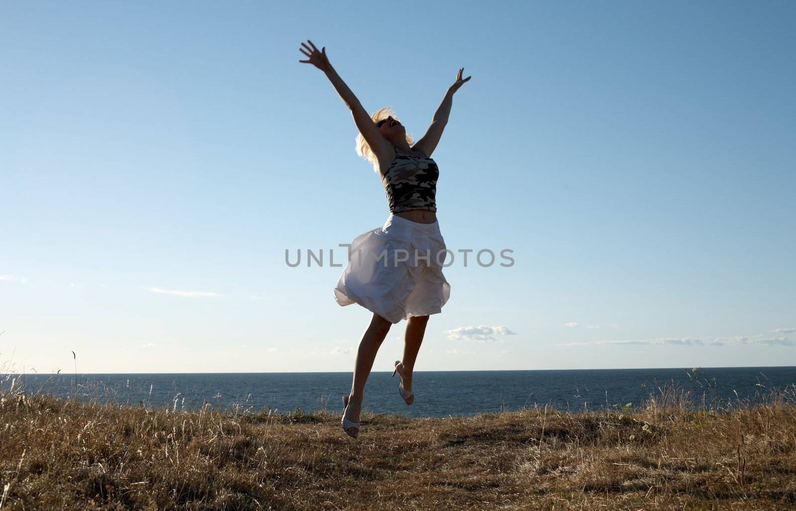 pretty blond jumping