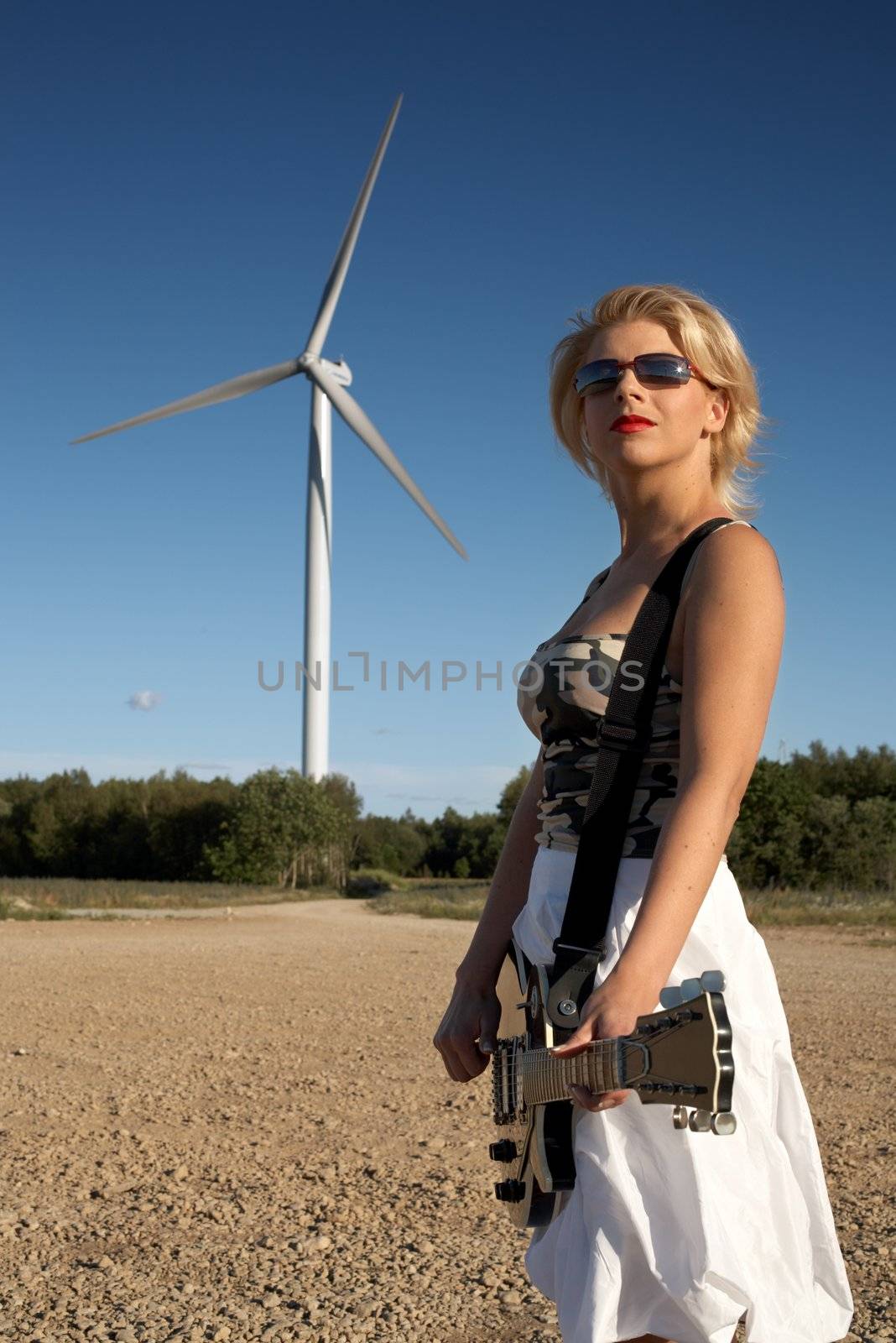 Pretty blond with guitar