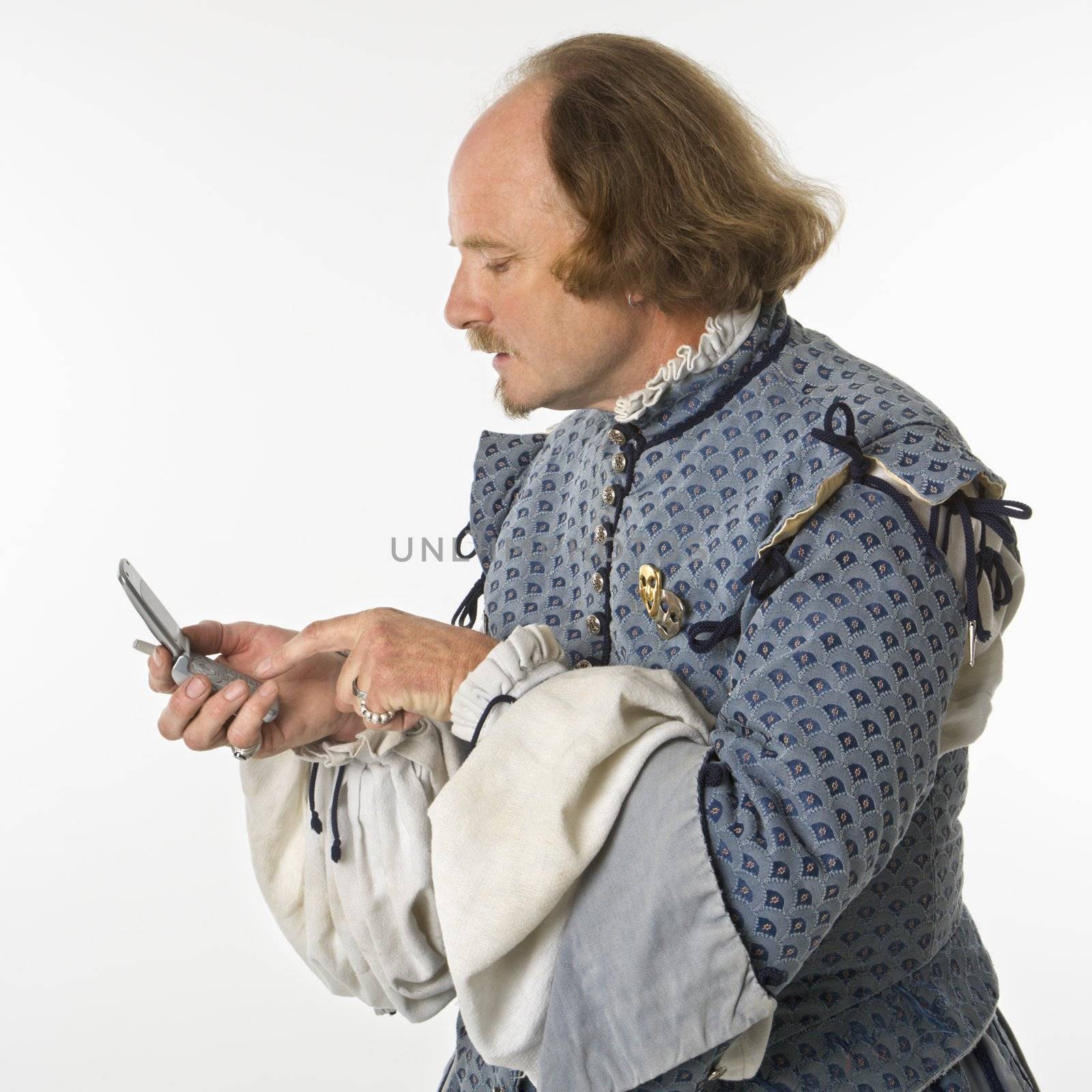Shakespeare using cell phone. by iofoto