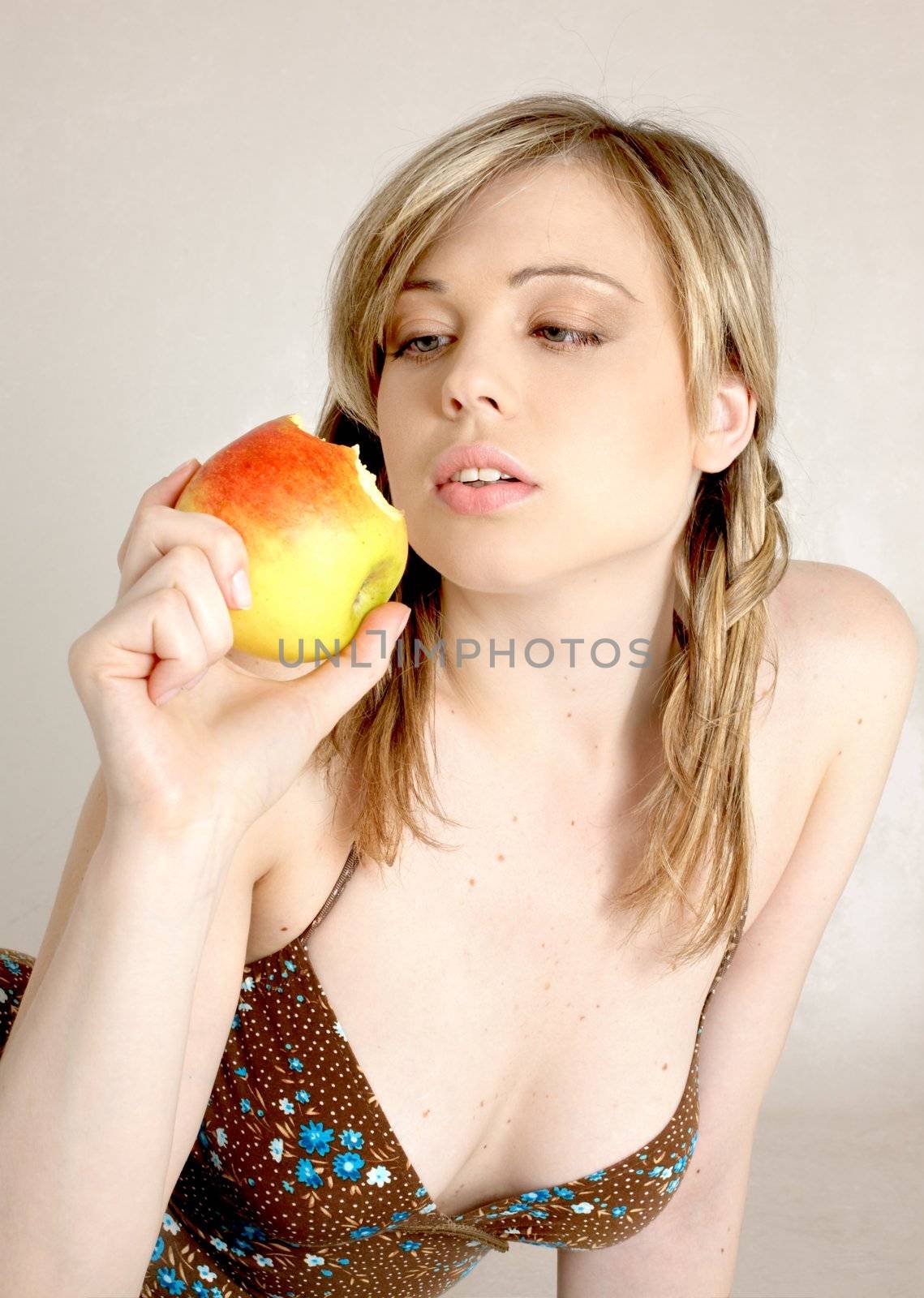 lovely girl eating apple
