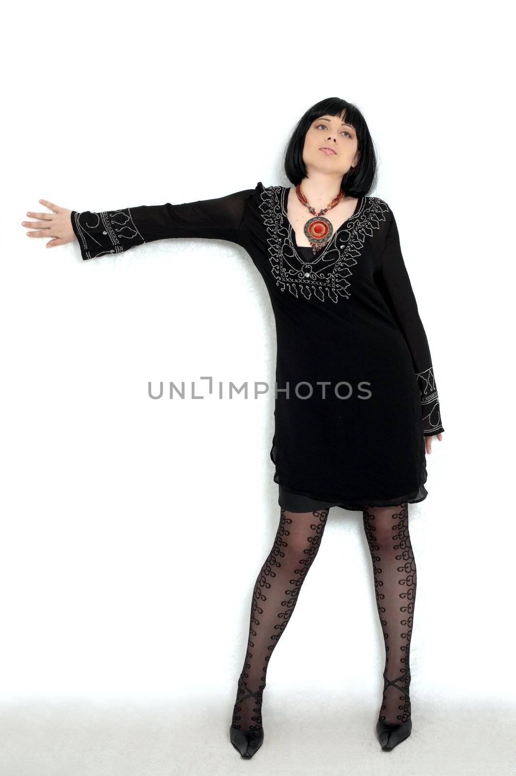 lady in black over white background